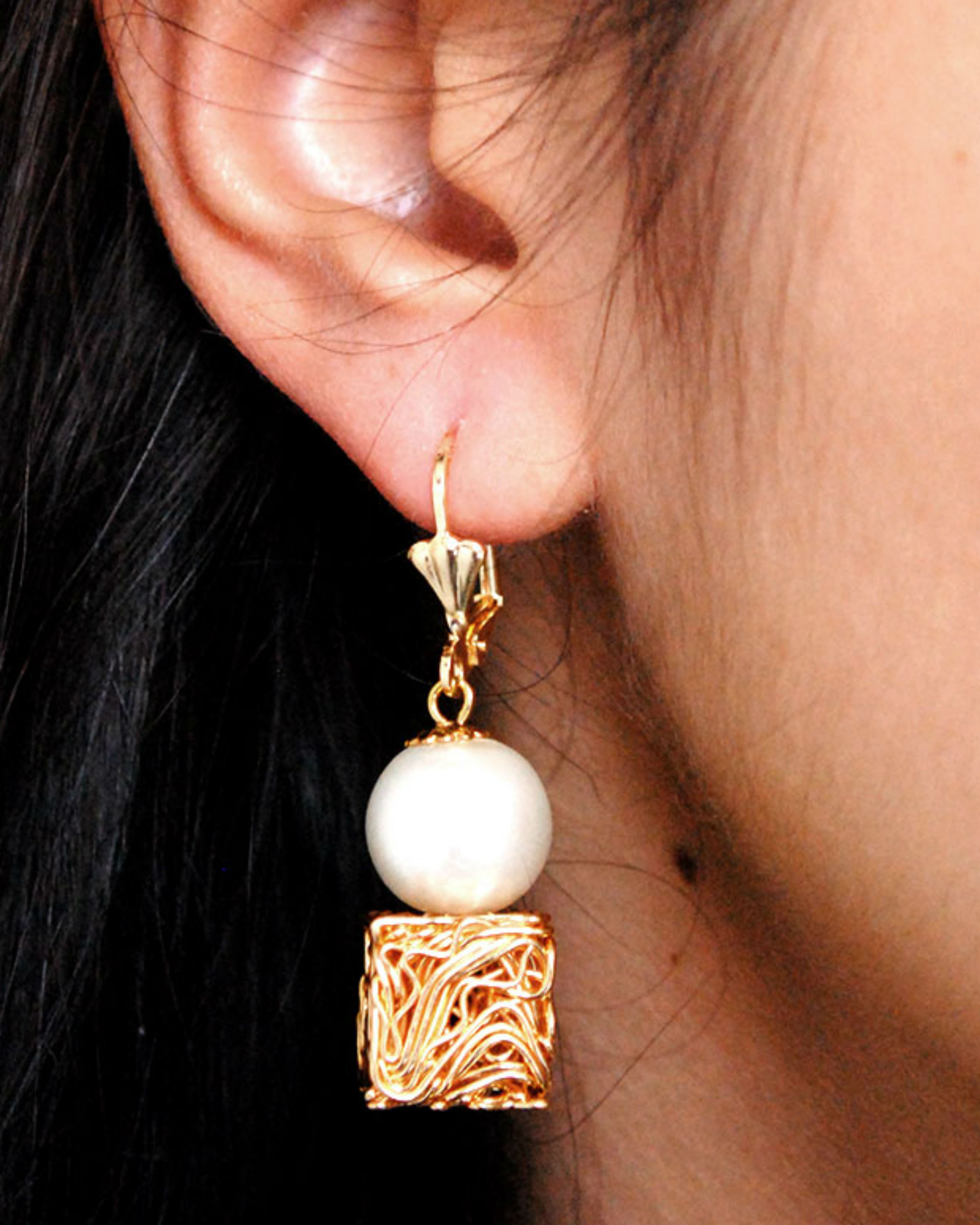 Golden cube interlock earrings