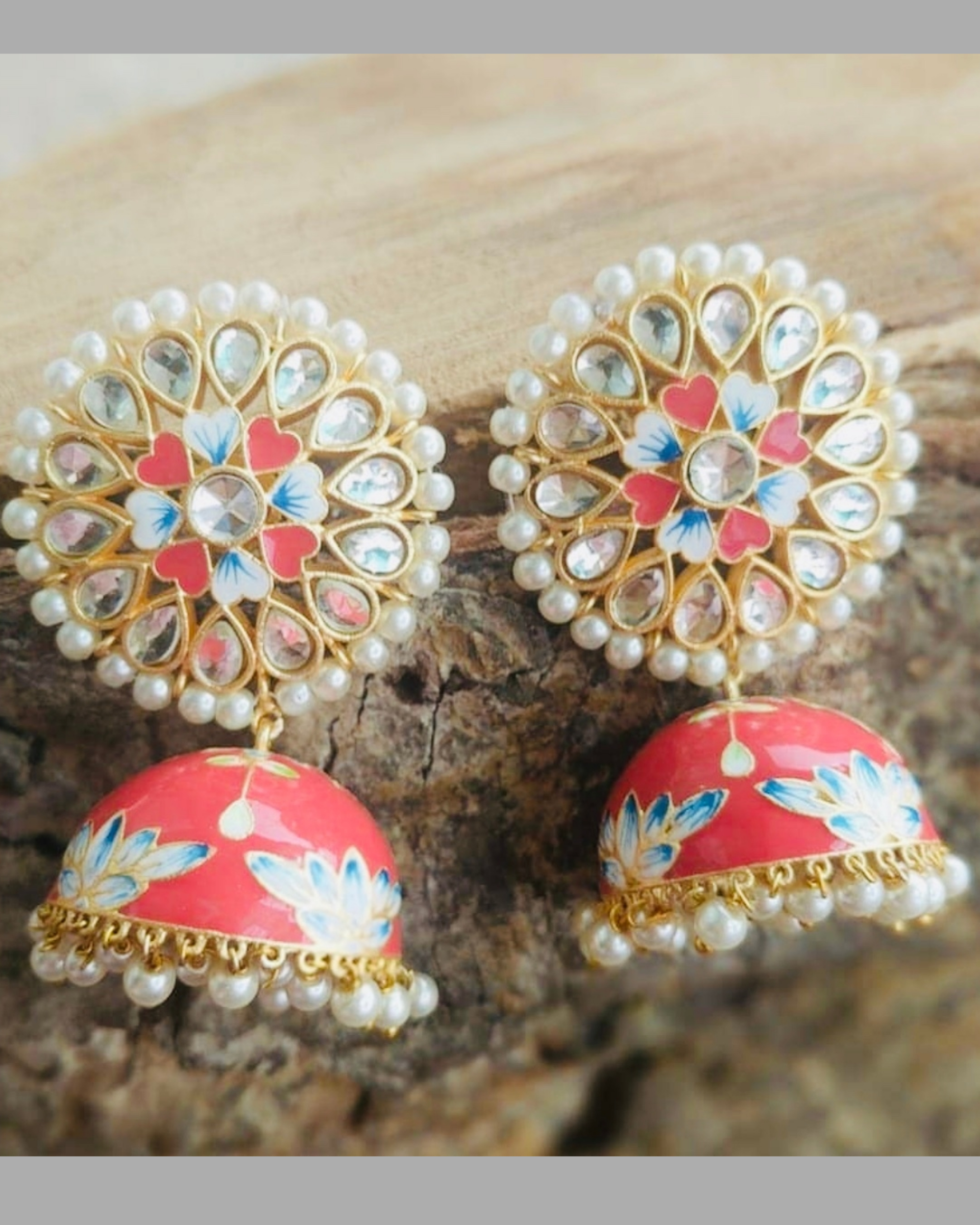 Orange pearl meenakari jhumkas by Amreli Jaipur | The Secret Label