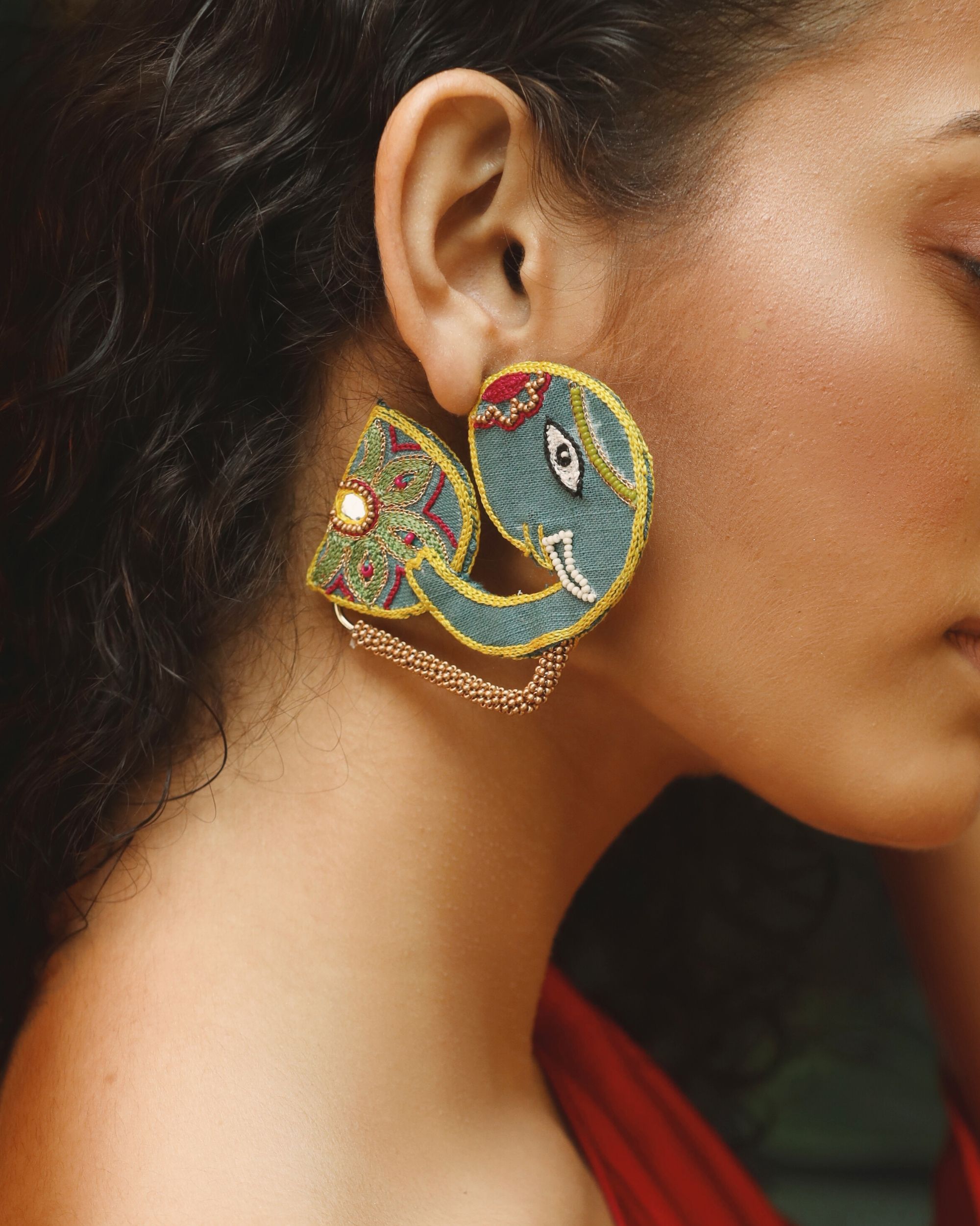 Elephant motif hoop earring