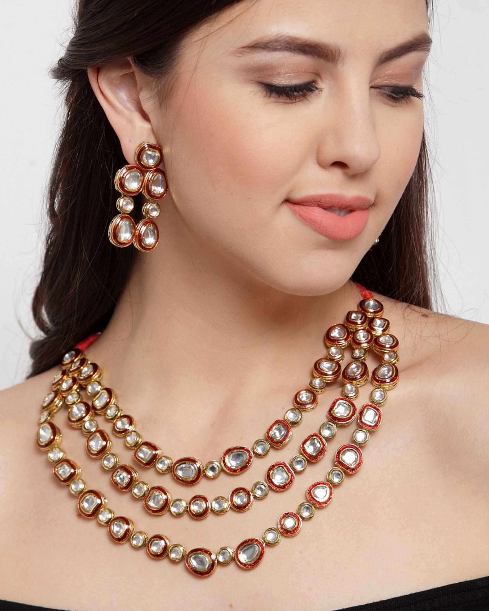 Red meena kundan multi strand neckpiece and earring Set Of Two by Dugri Style The Secret Label