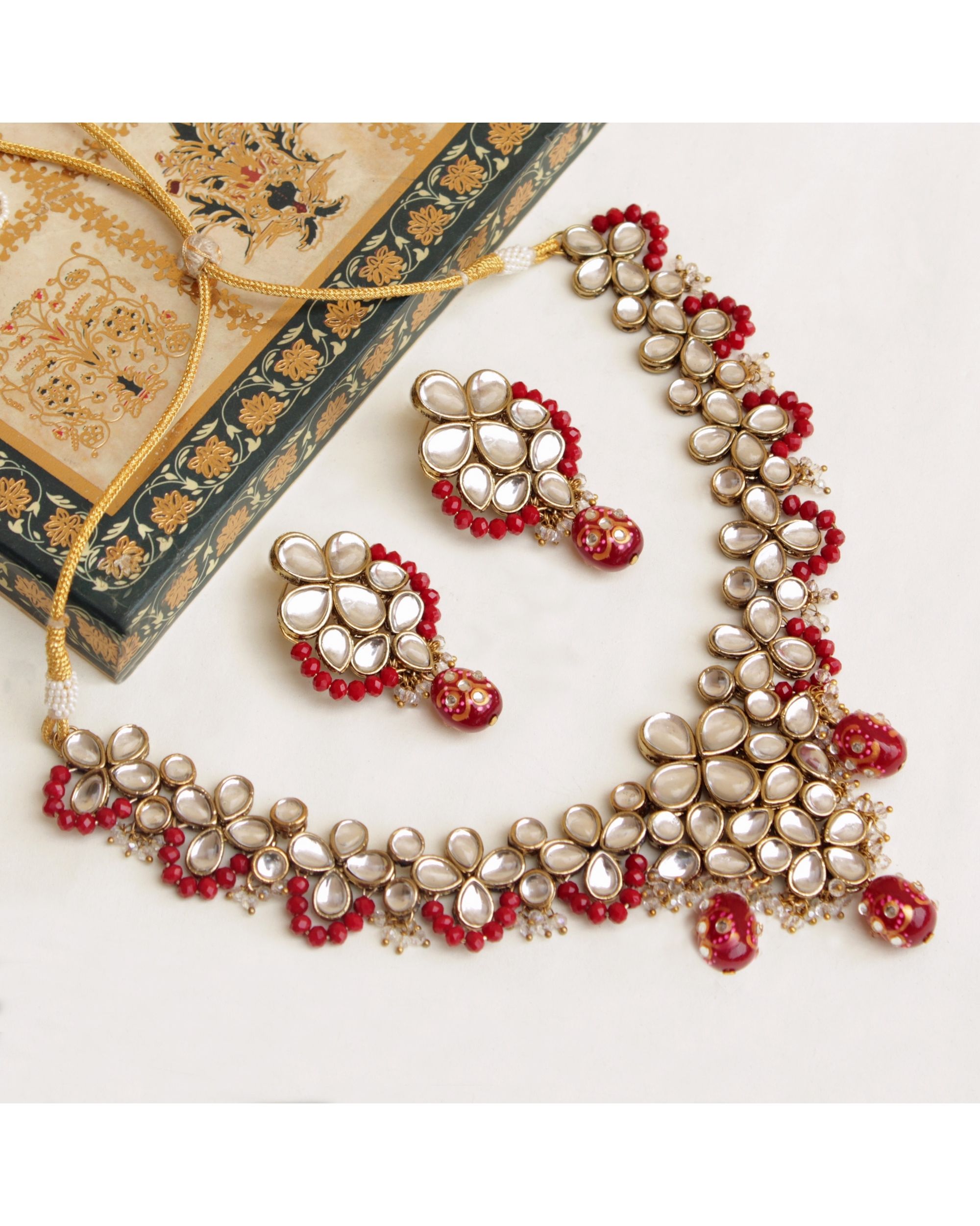 Red crescent kundan neckpiece with earrings - set of two