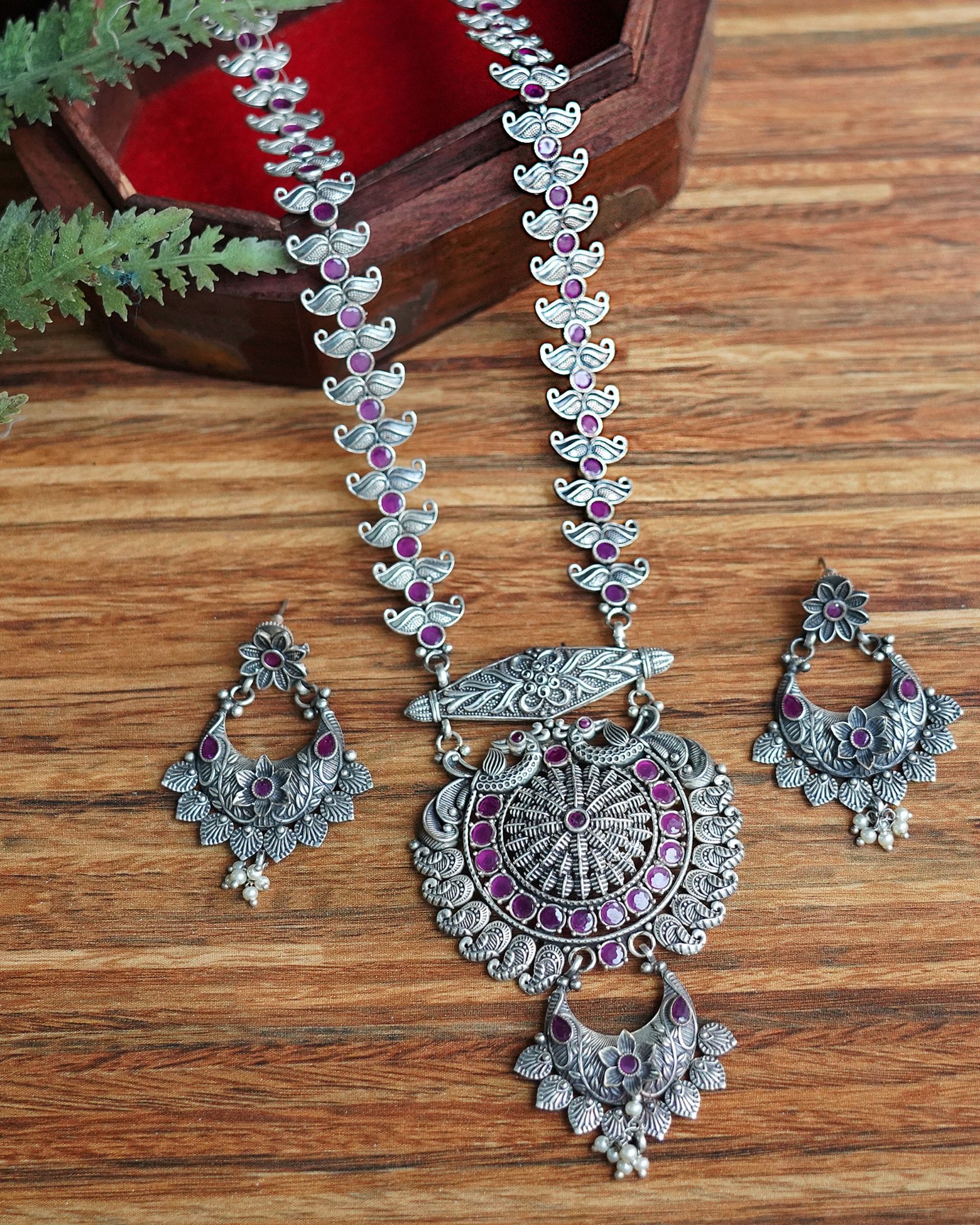 Peacock and floral engraved neckpiece with earrings - set of two.