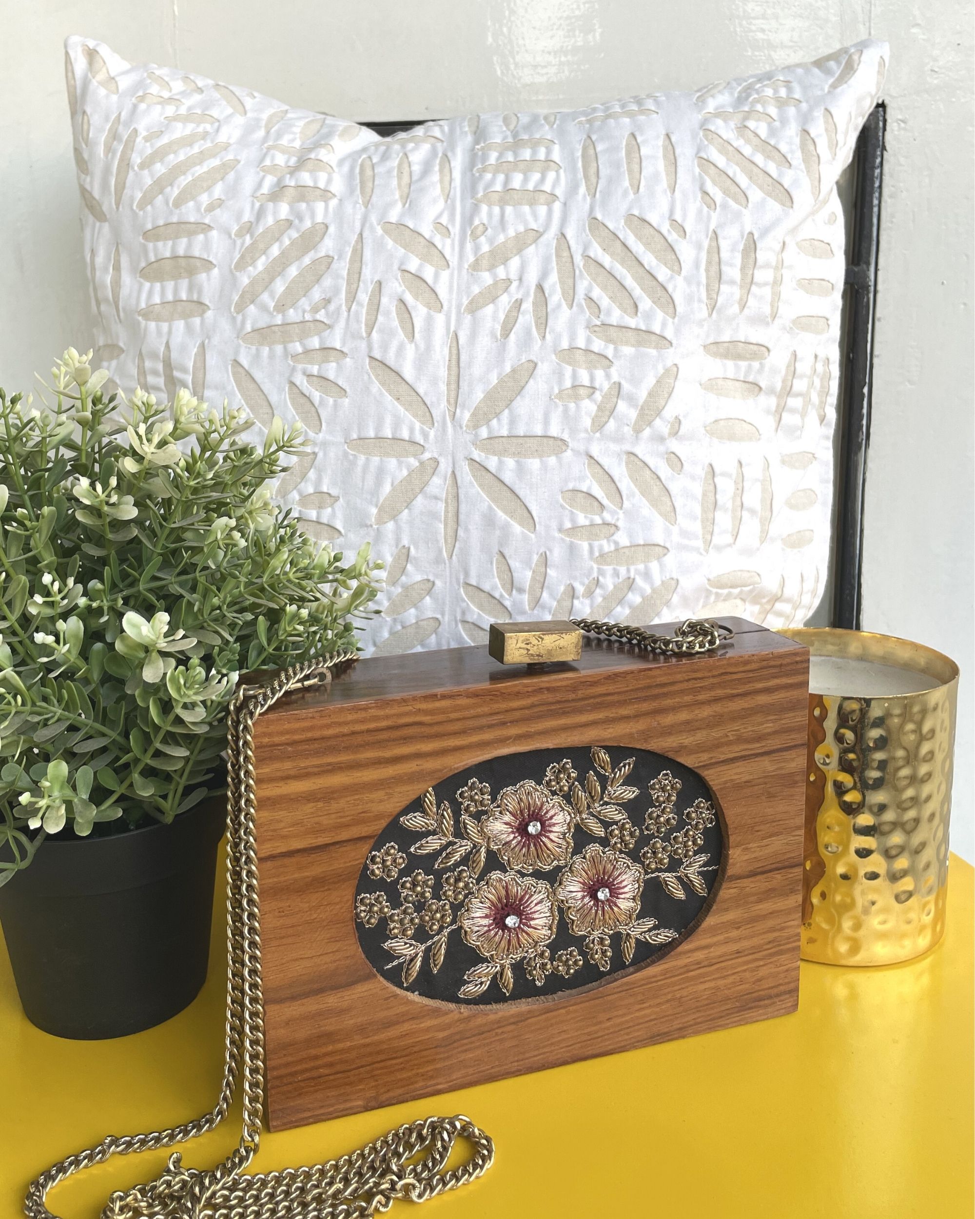 Black and brown embroidered wooden clutch with chain strap