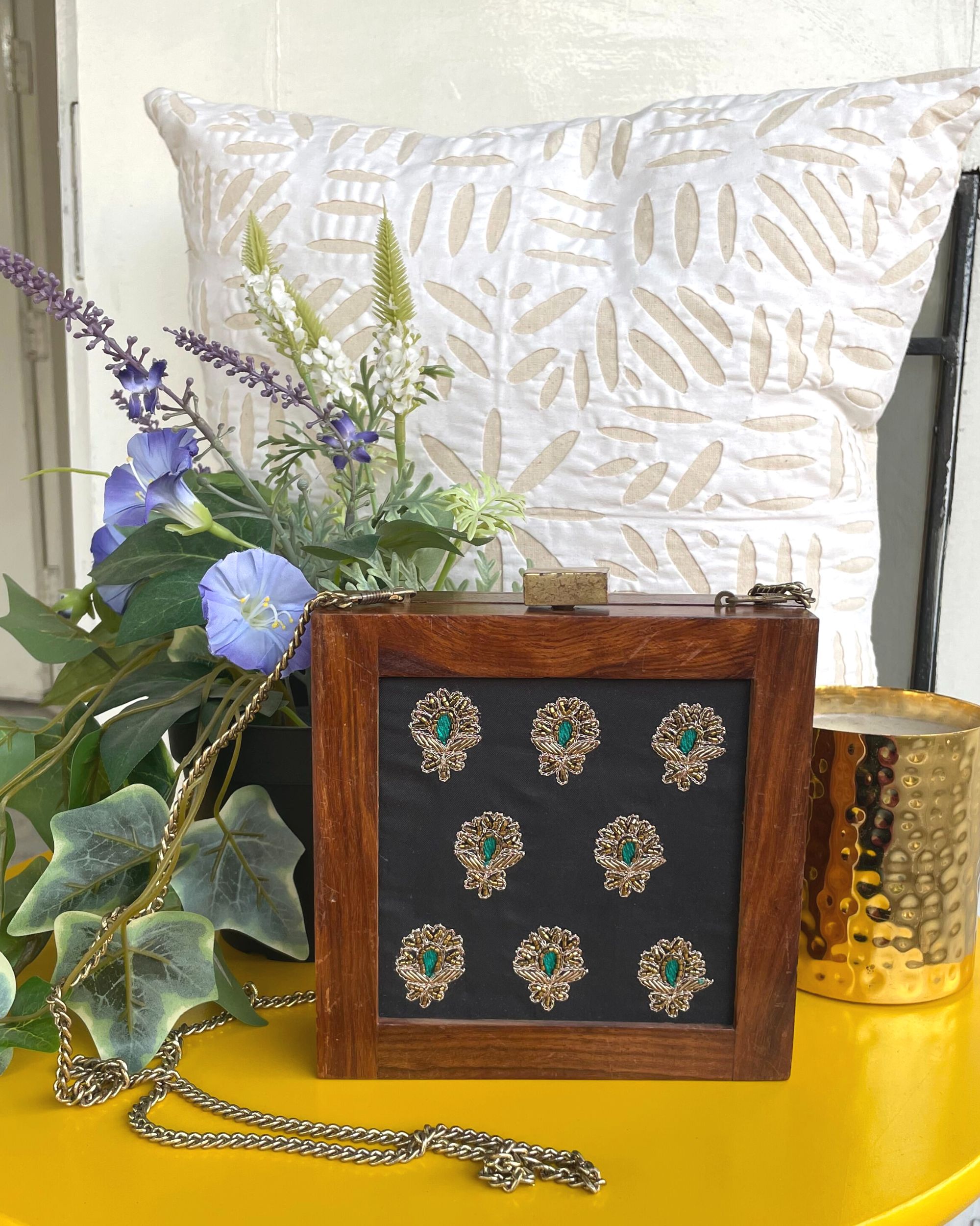 Golden and green buta embroidered wooden clutch with chain strap