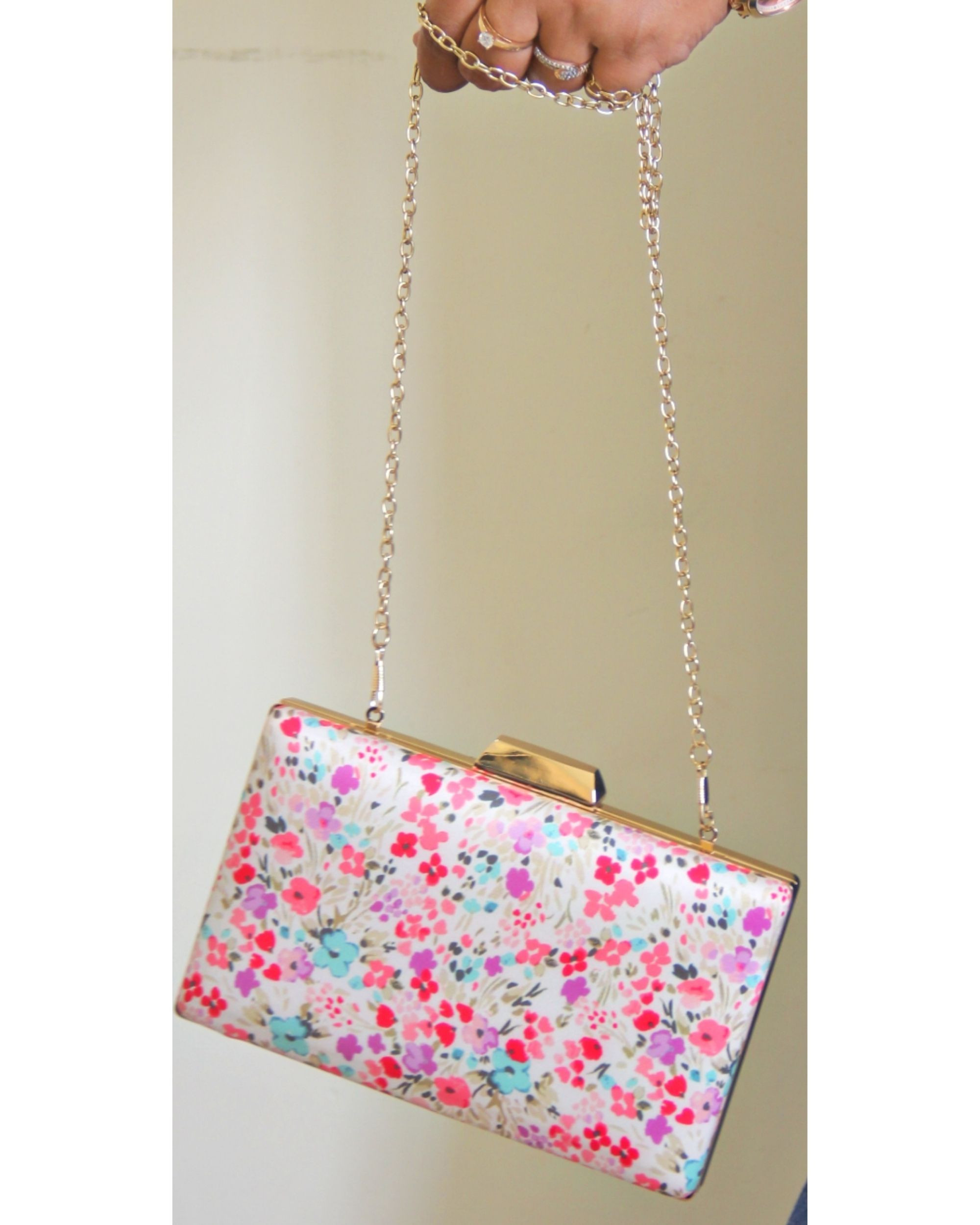 Pink discount floral clutch