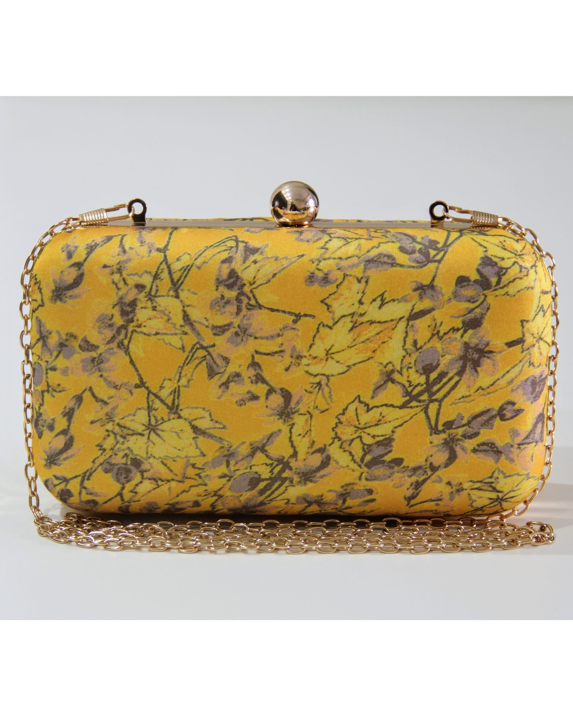 Yellow floral paradise printed clutch bag by Assortia | The Secret Label