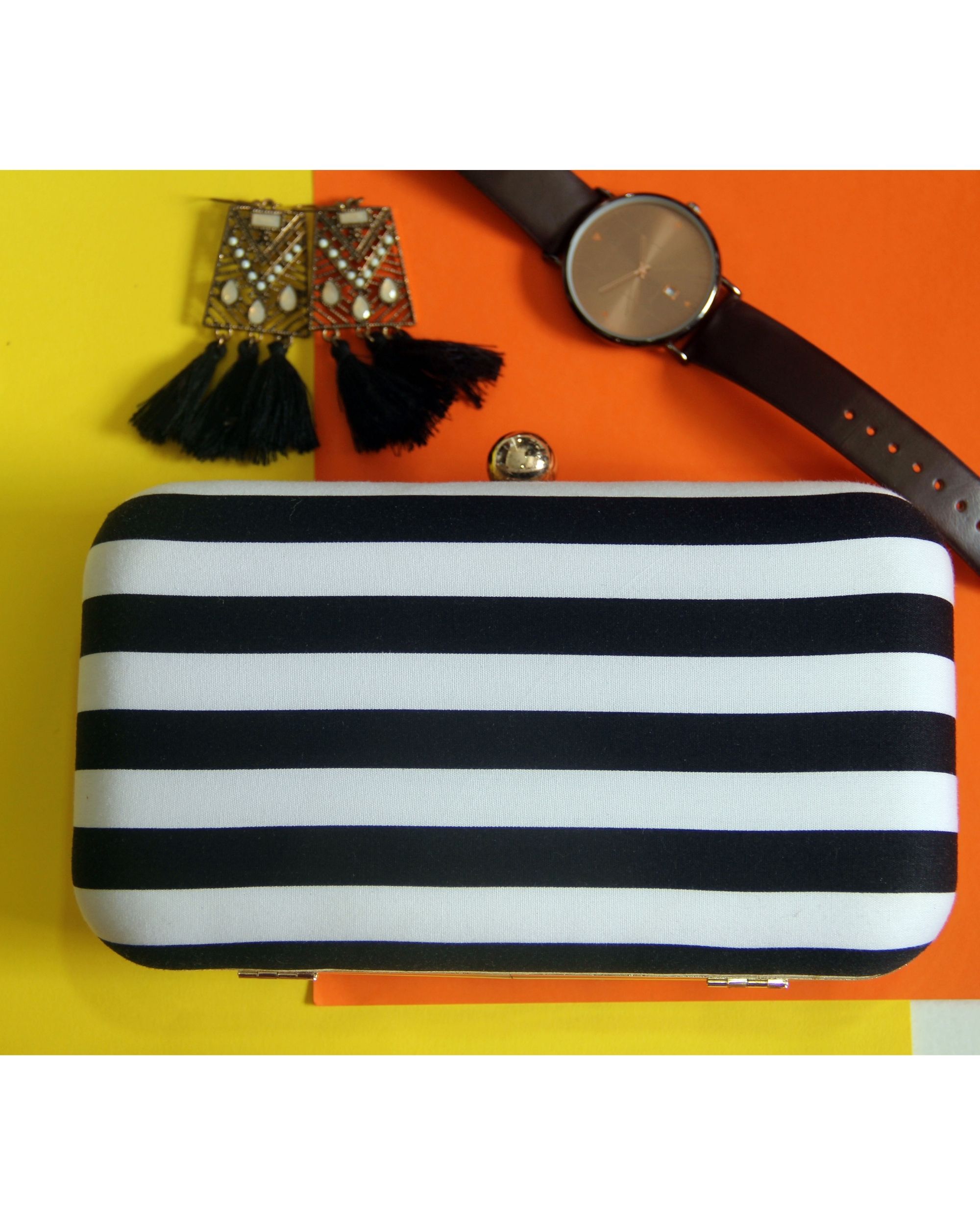 Black & white striped clutch bag by Assortia