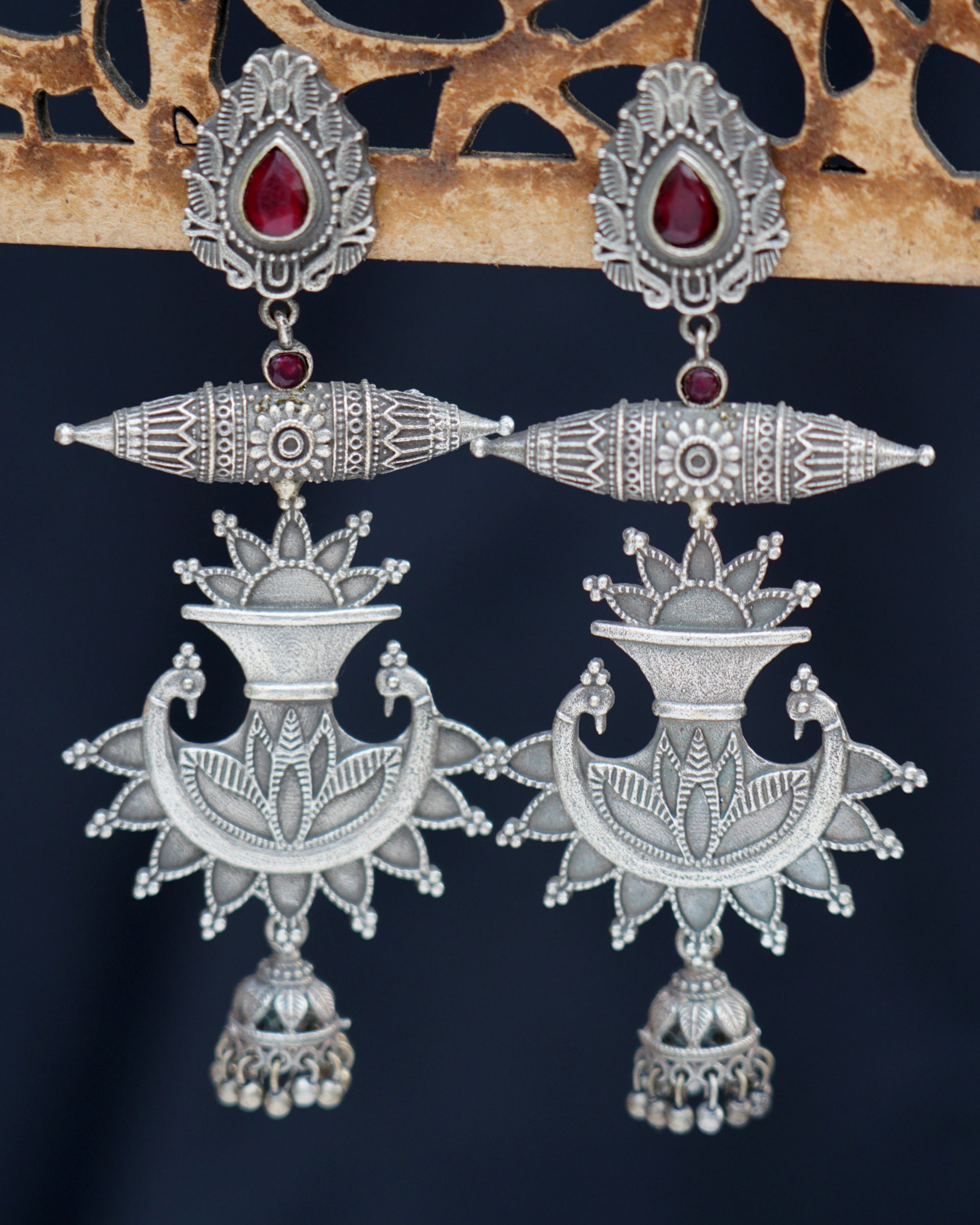 Red stone embellished long brass earrings