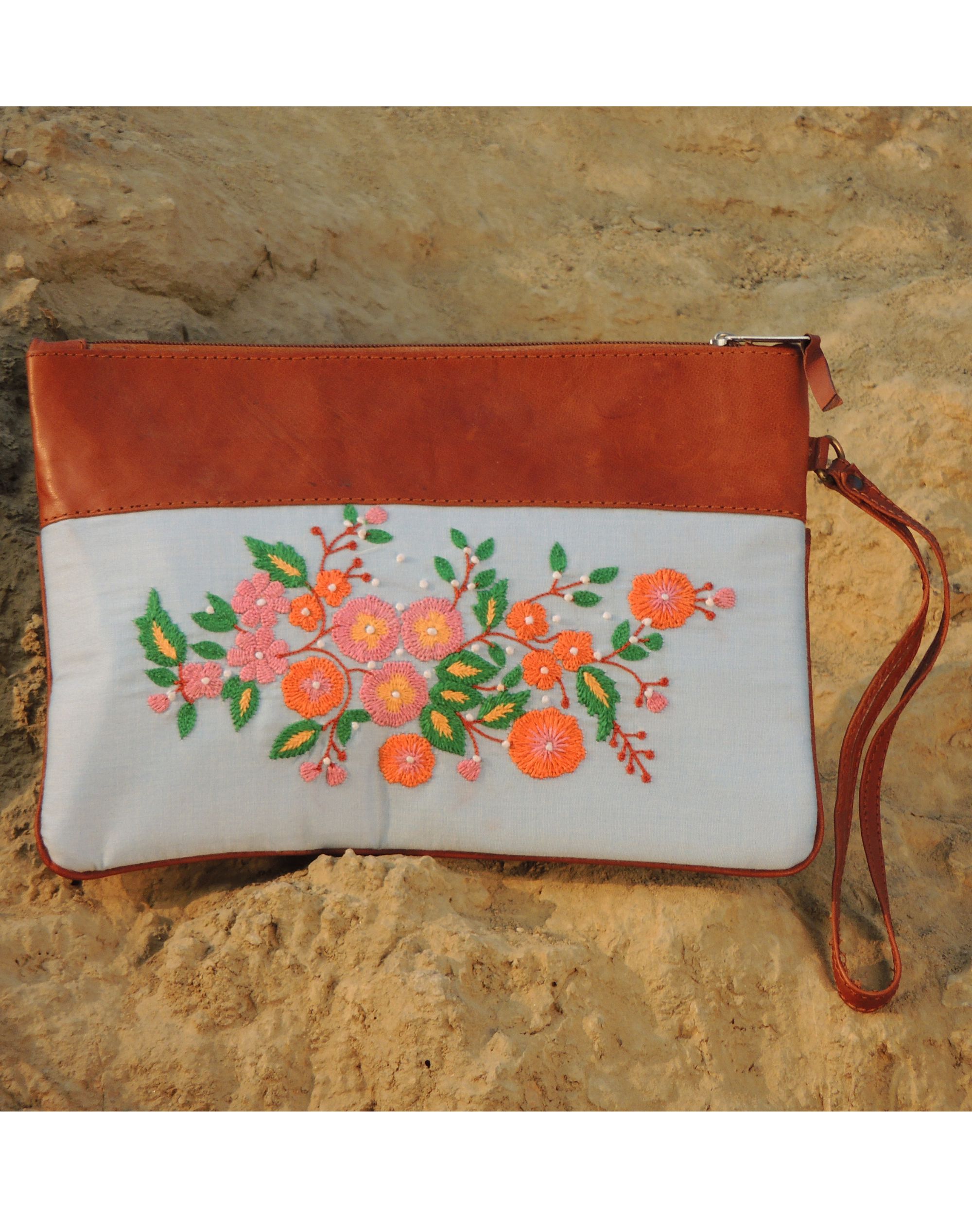 Orange and blue clutch bag hot sale