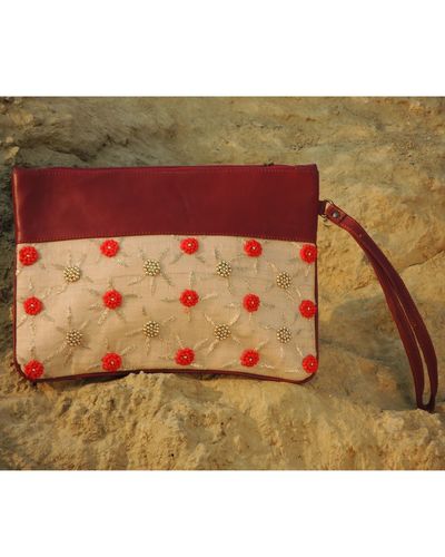 Buy Praccessorii Orange Printed Clutch at Best Price @ Tata CLiQ