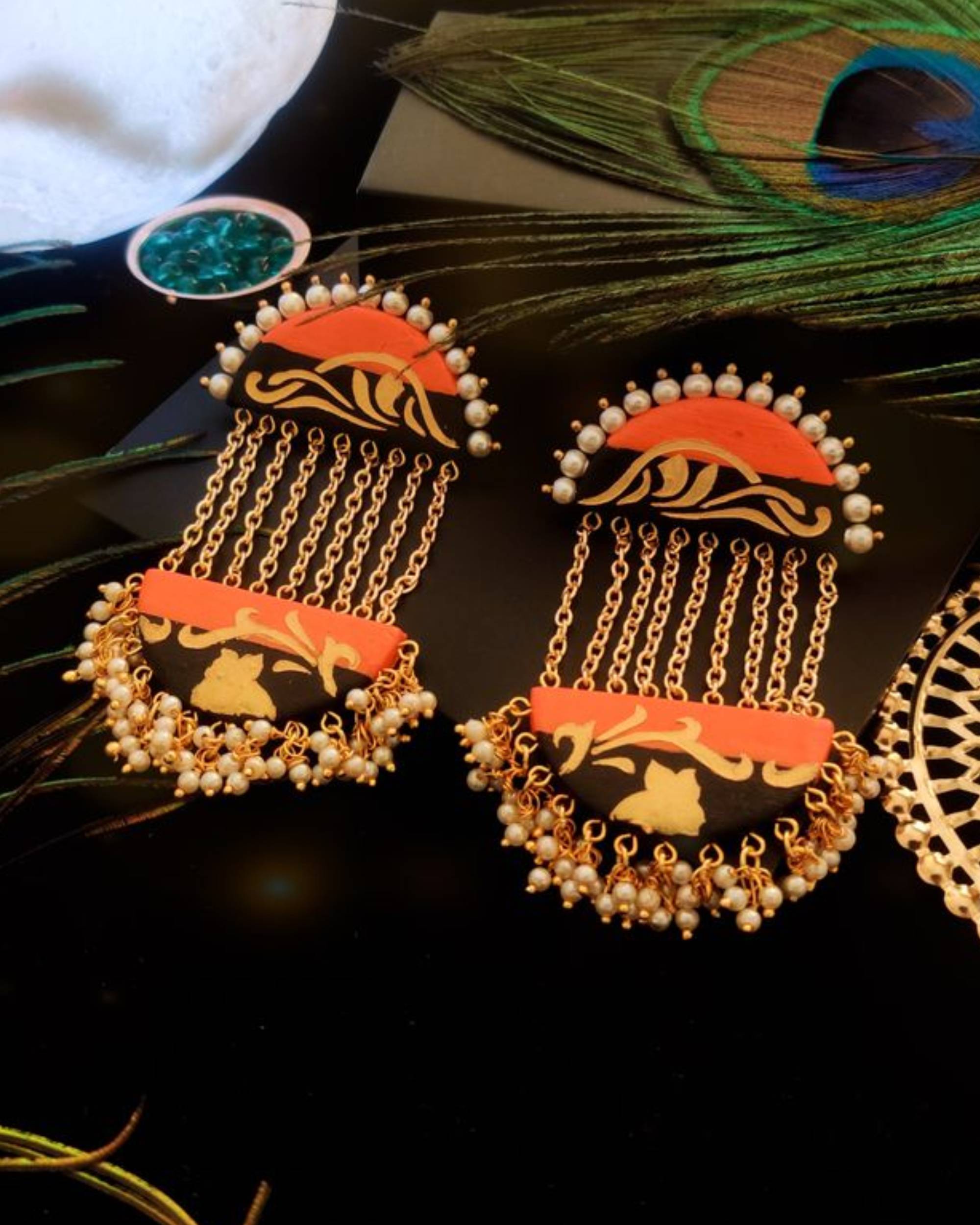 Black and orange statement dangler earrings