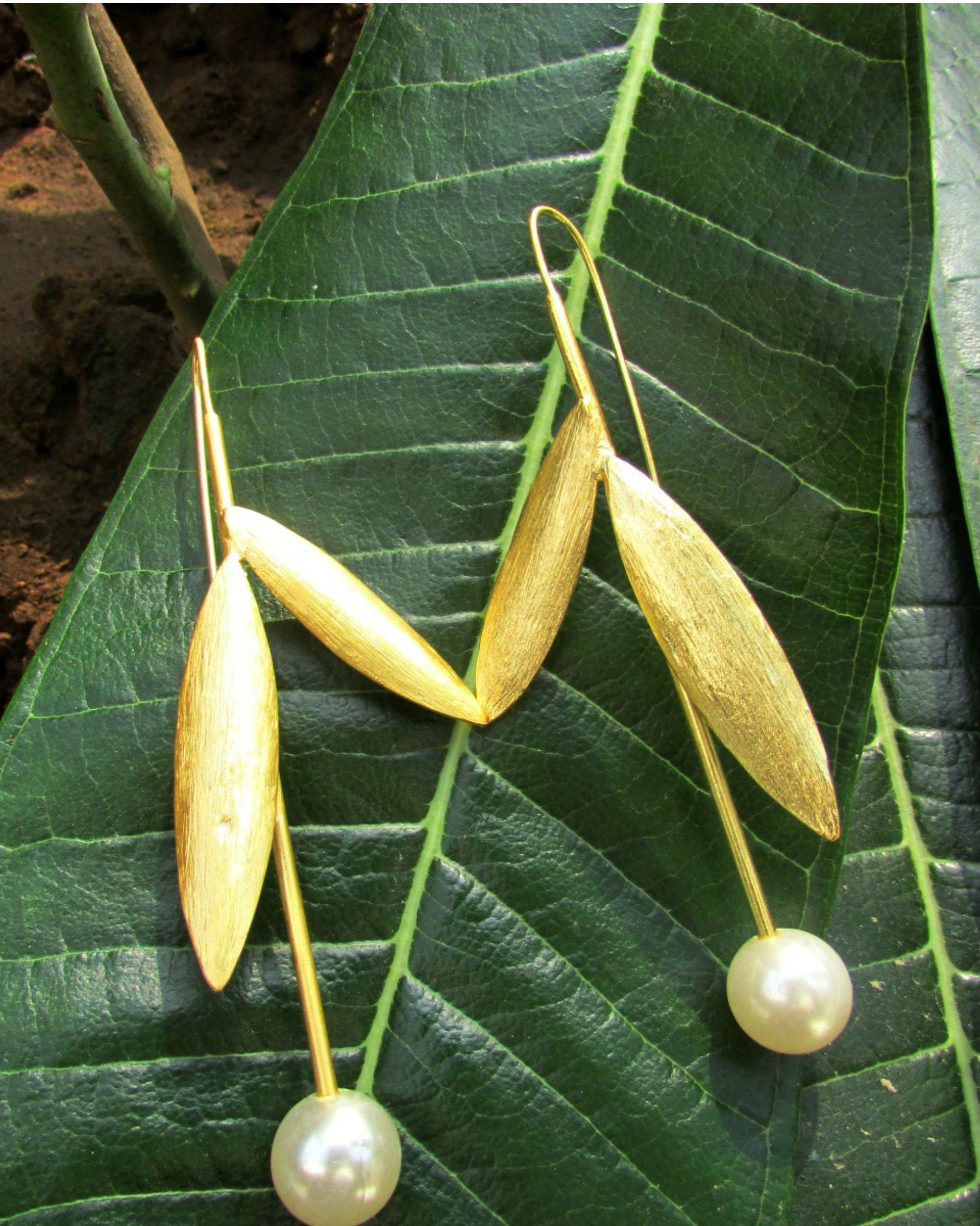 Hanging pearl leaf earrings by AnahikA The Secret Label