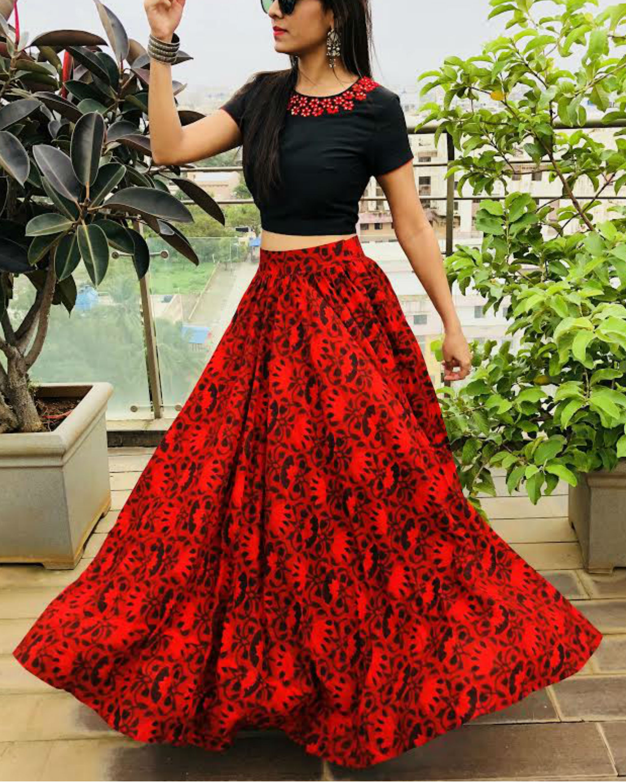 red and black skirt and top