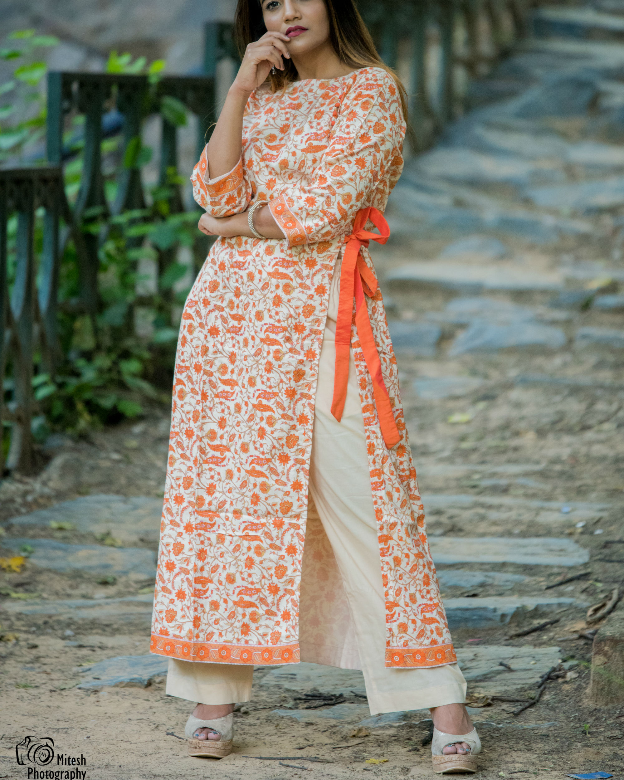 Beige orange side slit kurta set by Elanora | The Secret Label