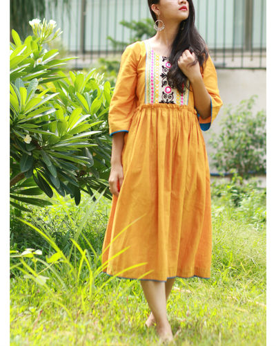 Mustard yoke dress by Threeness | The Secret Label