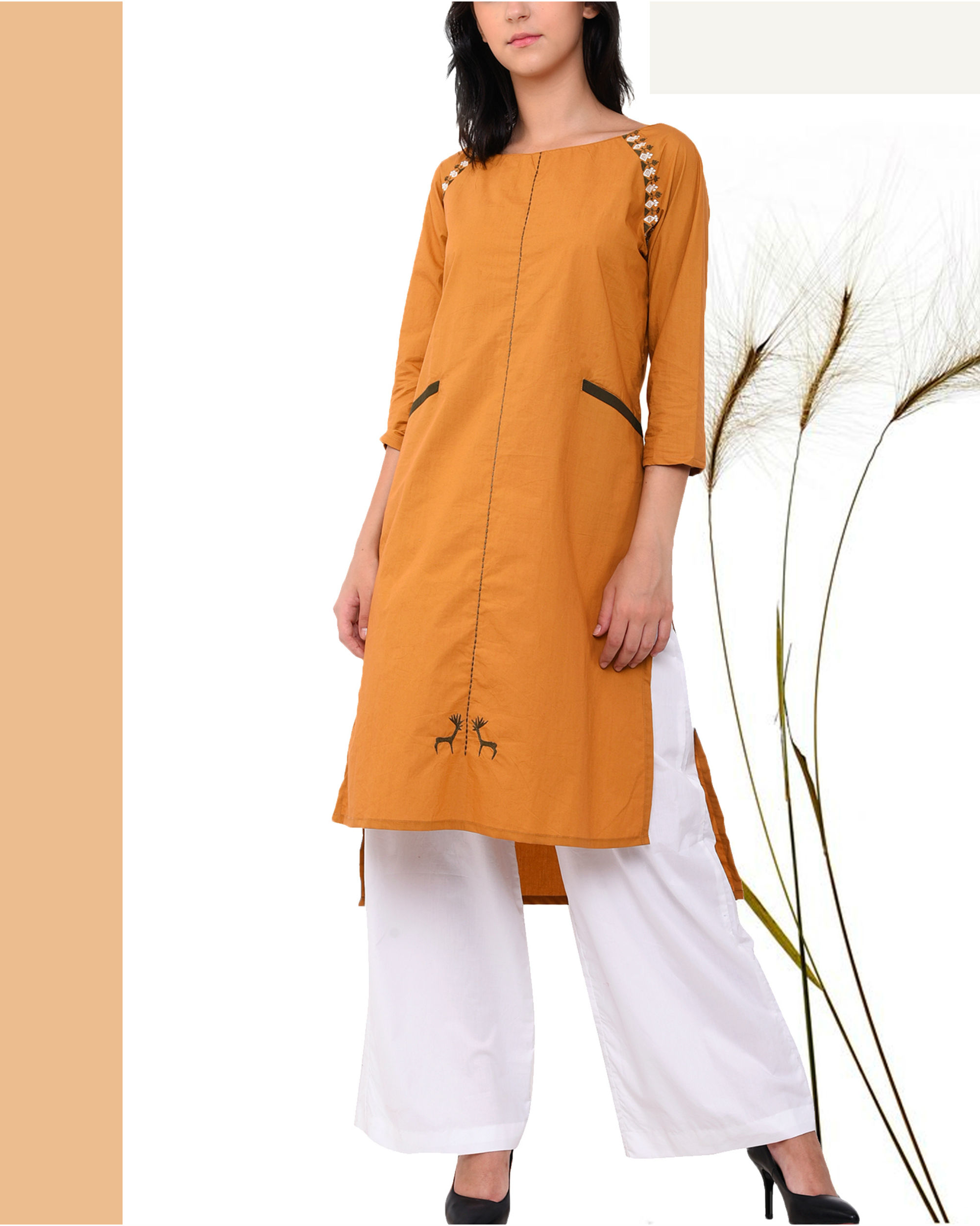 Mustard embroidered high low kurta set by Vritta The Secret Label
