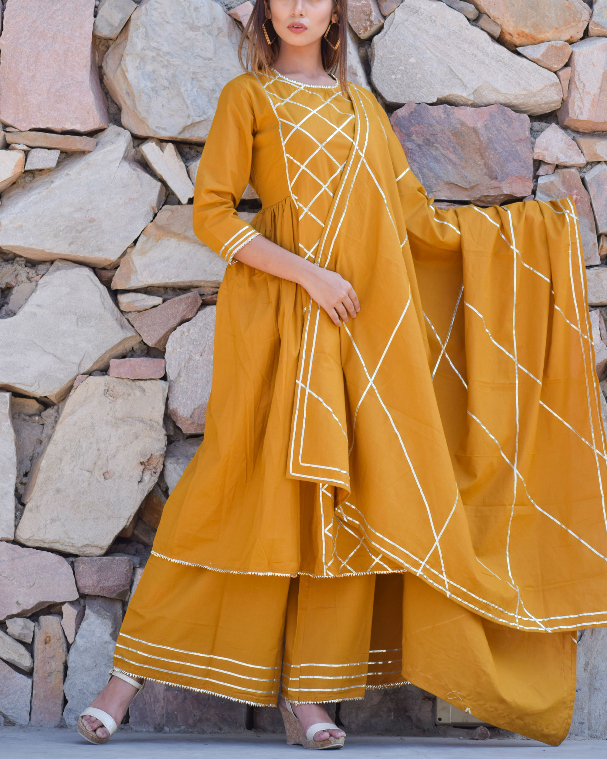 Mustard side pleated kurta set with dupatta by Chokhi Bandhani The Secret Label