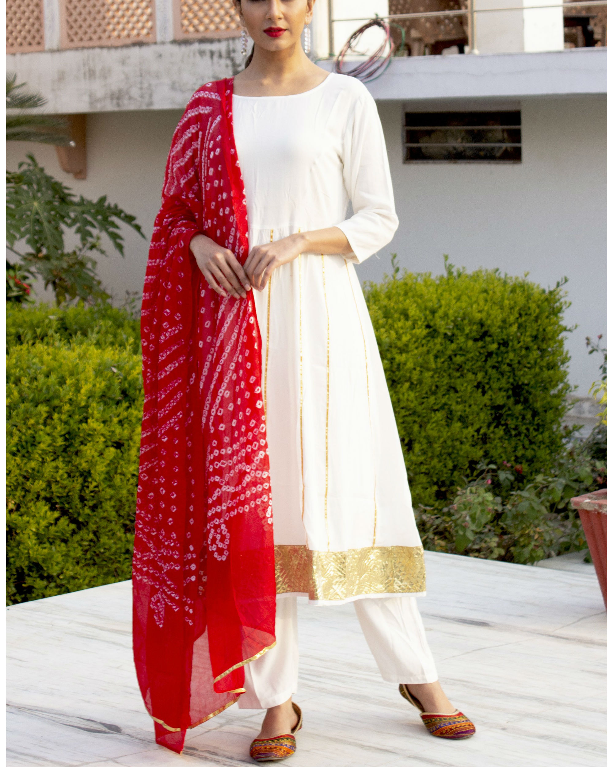 White kurta set red bandhani dupatta by Thread and Button | The Secret ...