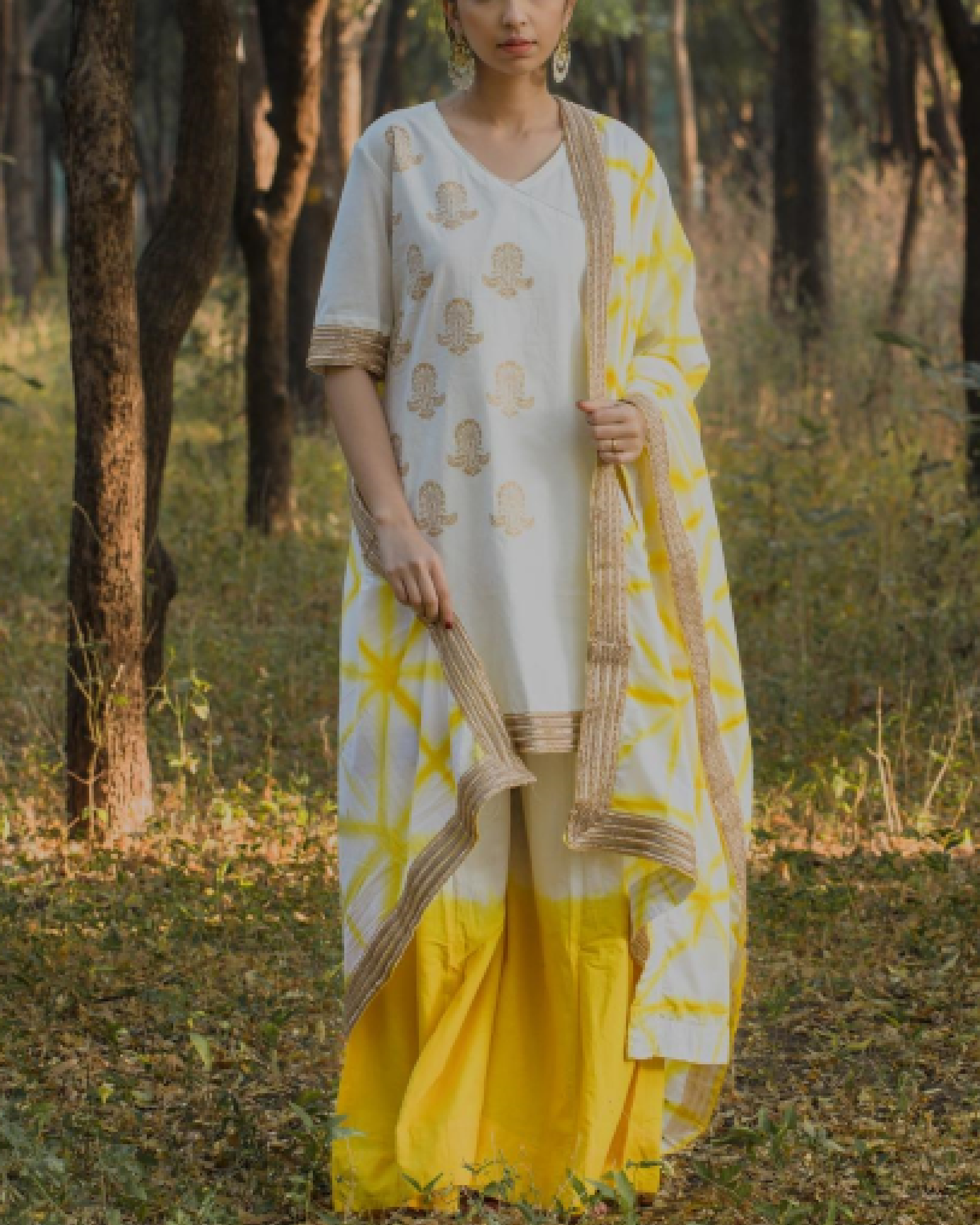 White and yellow angrakha set by The Label Studio | The Secret Label