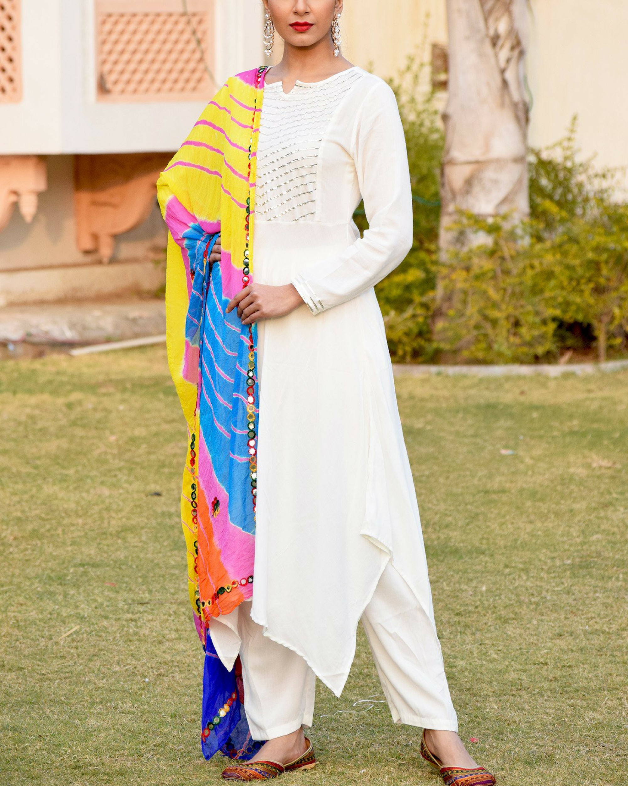 white suit with colourful dupatta