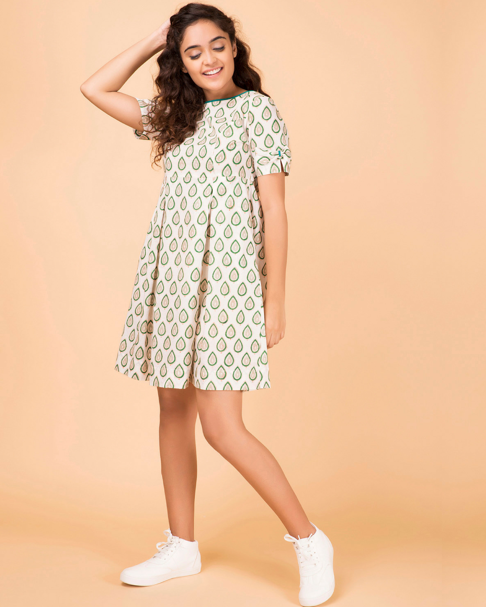 Green leaf pleated dress by Twirl Studio | The Secret Label