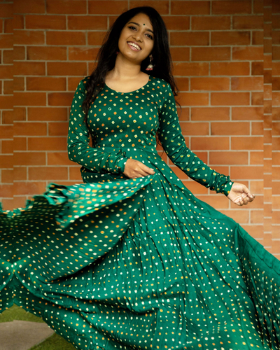 Green bandhani flared dress by Athira ...