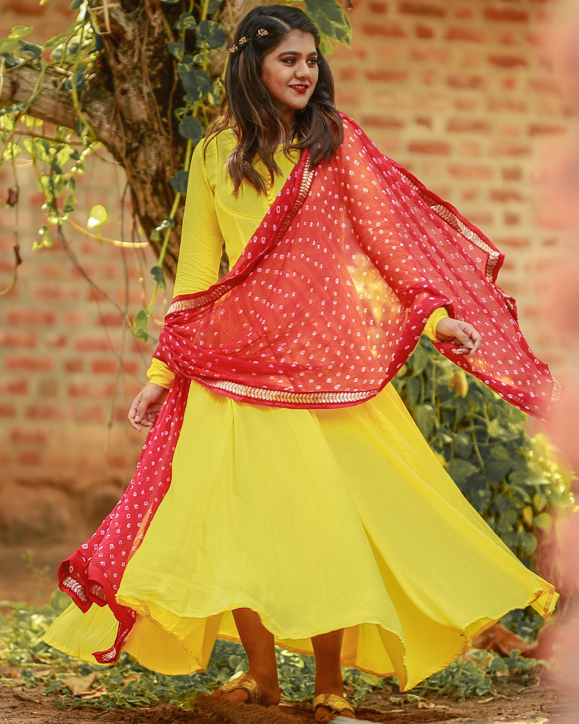 yellow dress with red dupatta