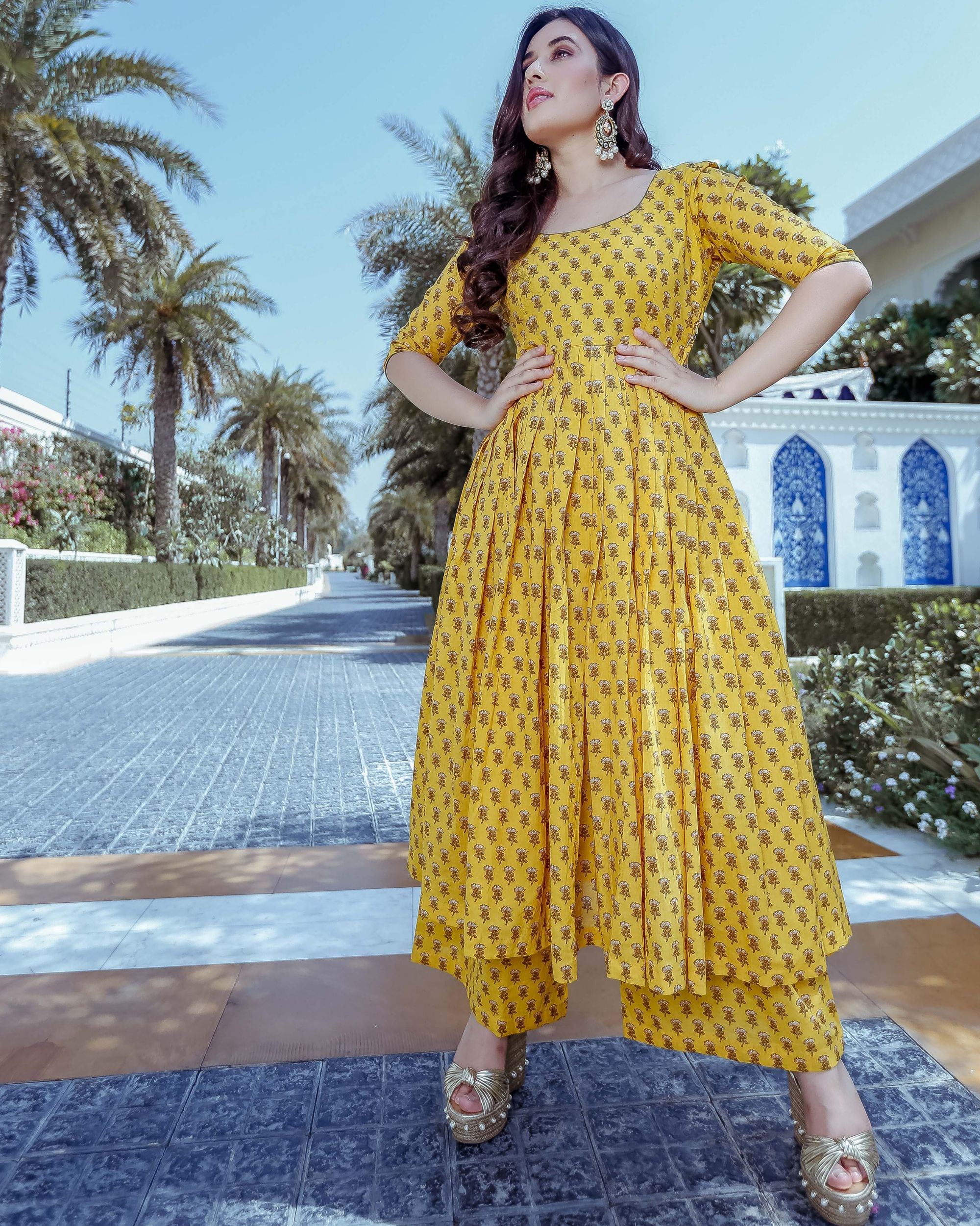 Yellow A line flare all over printed kurta with straight pants