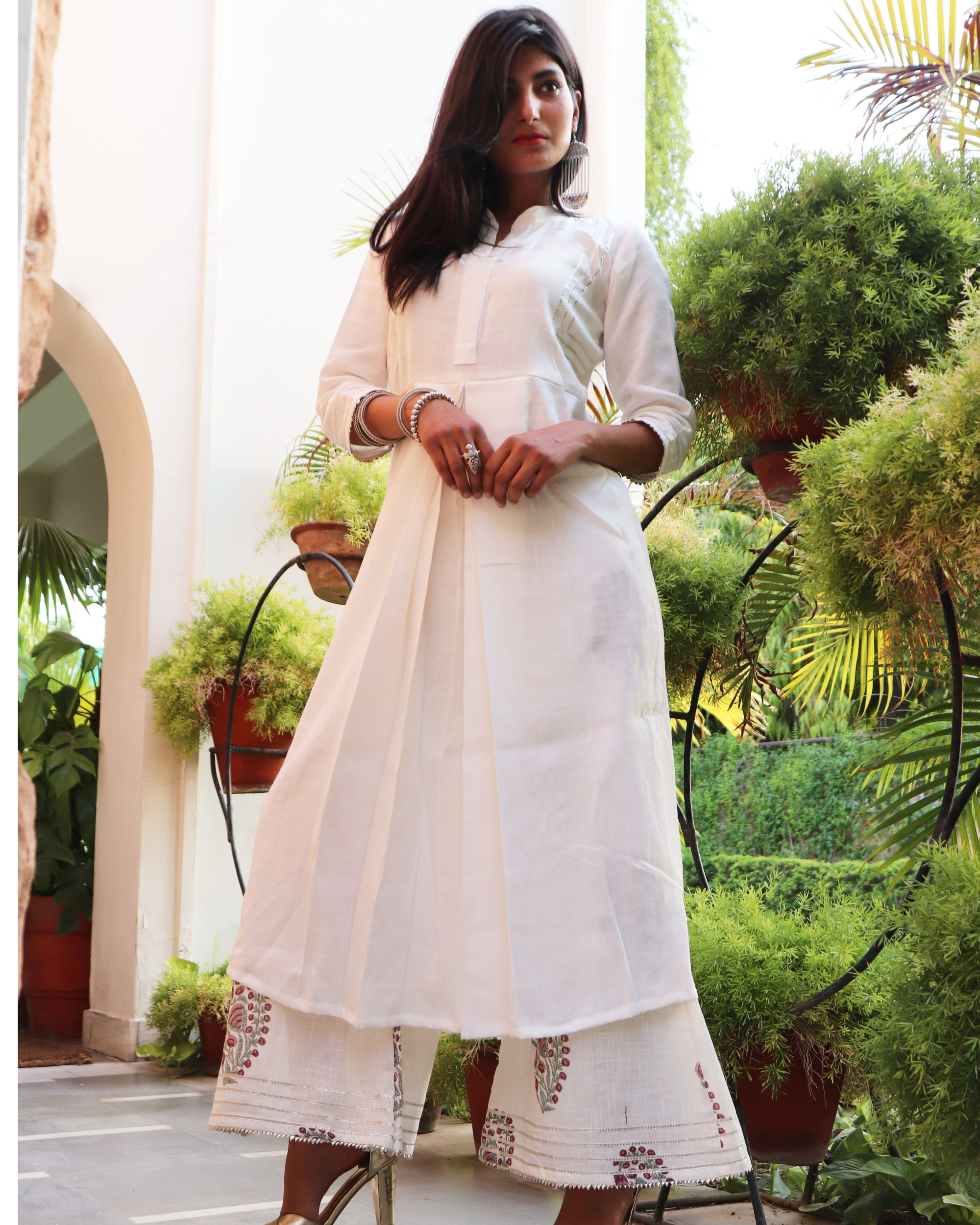 White collared kurta set with hand printed palazzoset of two by Label