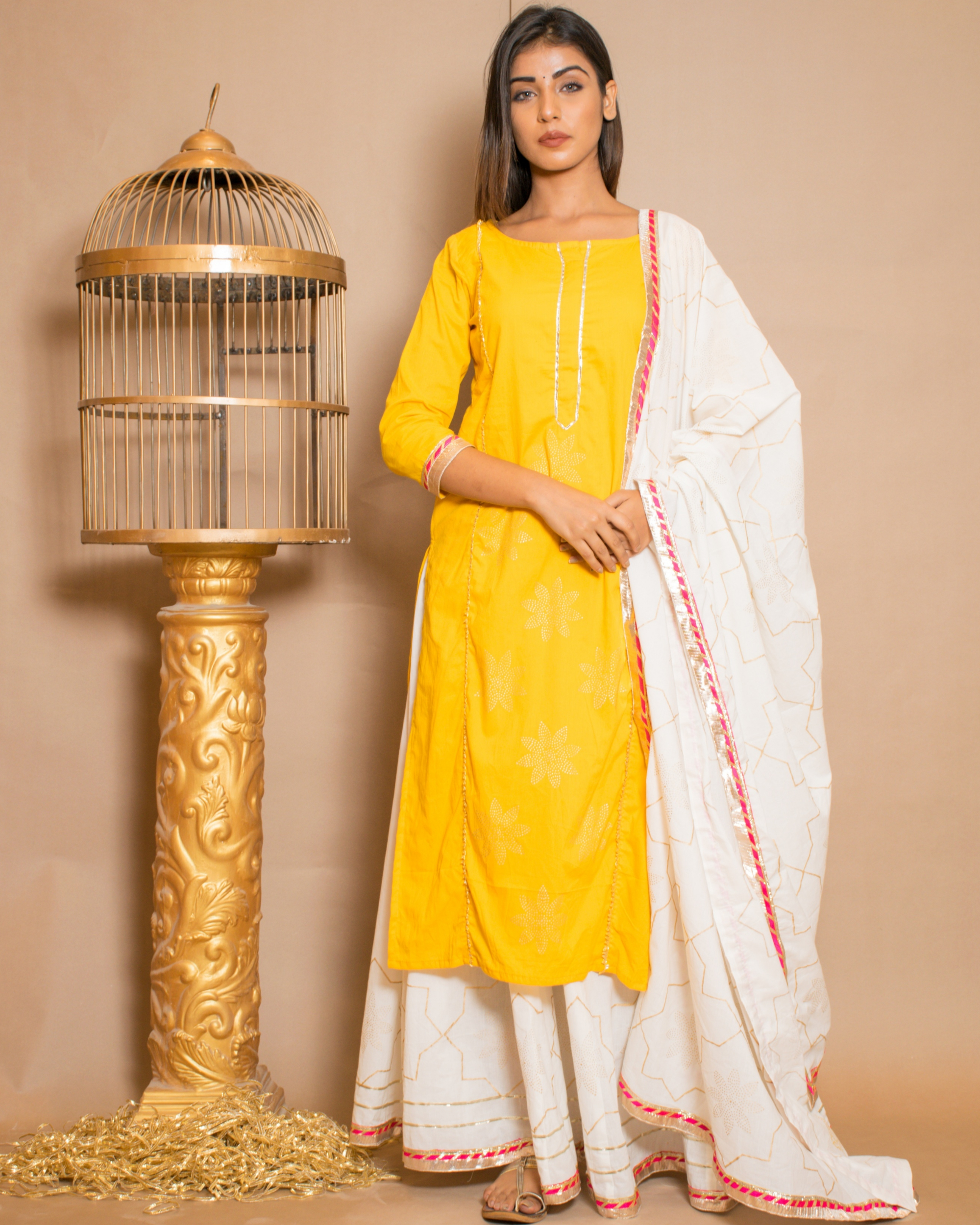 Yellow kurta with white skirt and dupatta - set of three