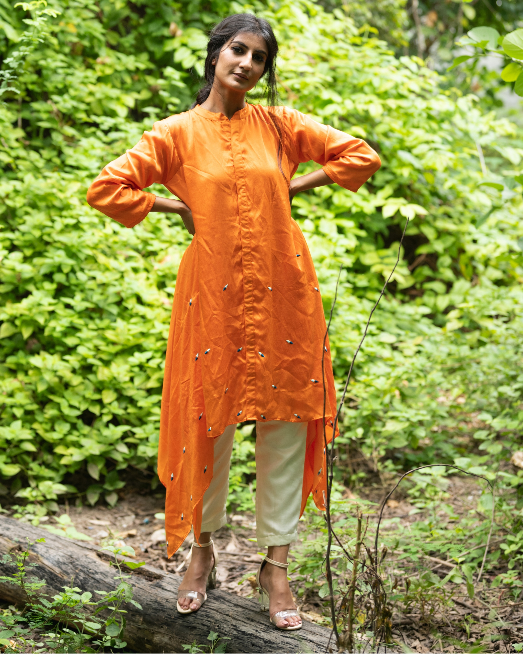 Orange embroidered asymmetric tunic by Neora | The Secret Label