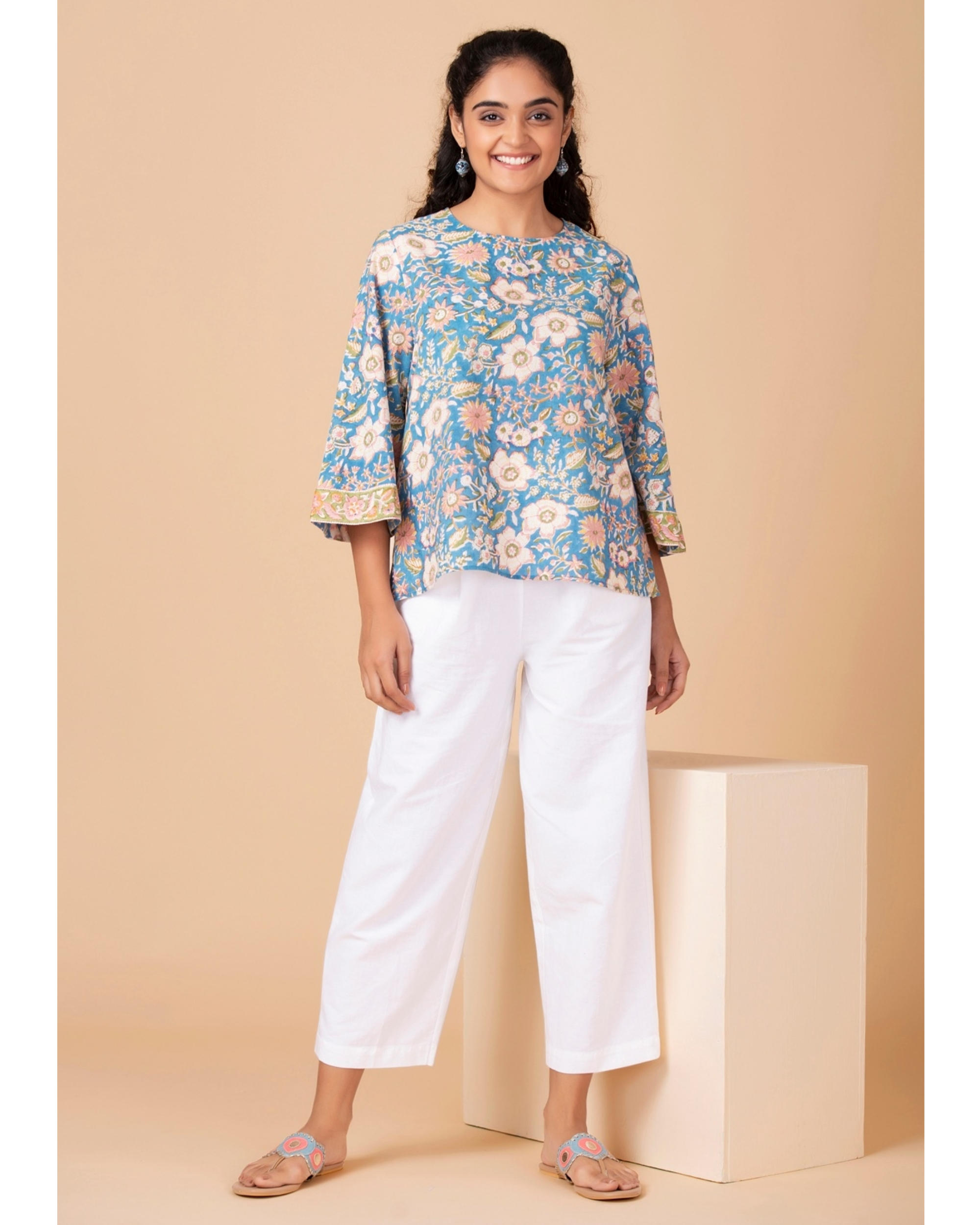 Aqua blue floral printed top by Twirl Studio | The Secret Label