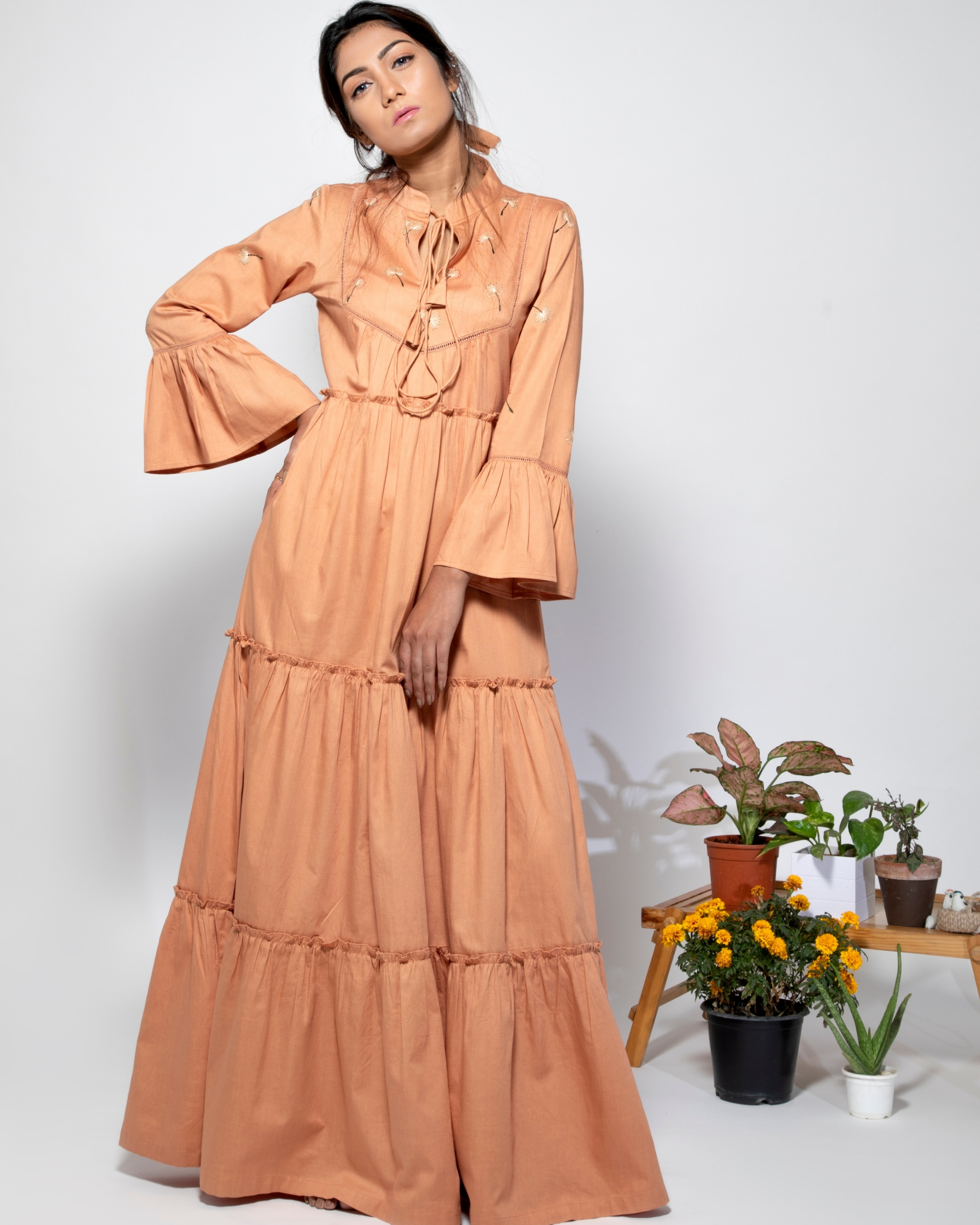 Salmon peach tiered floater dress with embroidered yoke by Santav | The ...