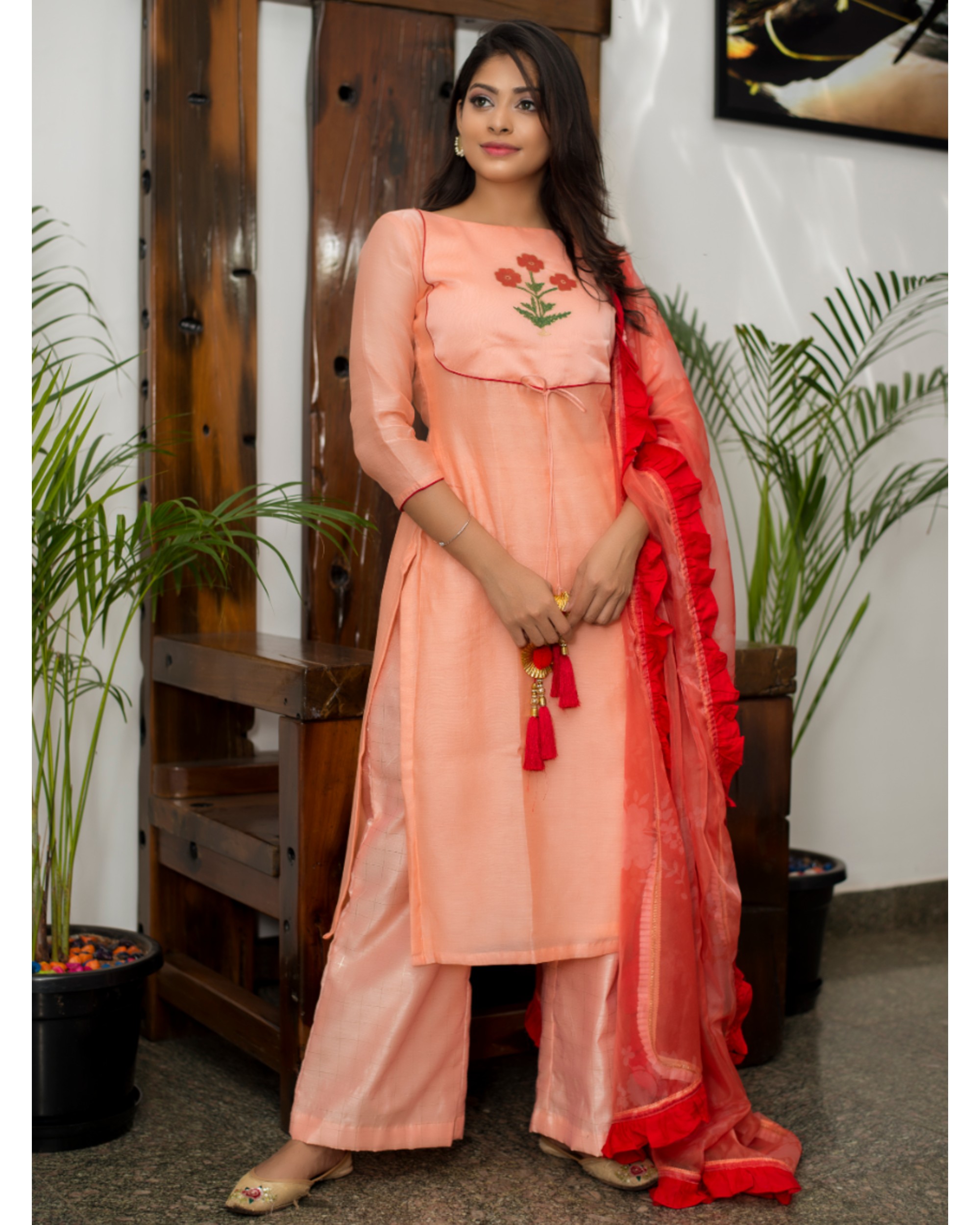 peach colour suit with red dupatta