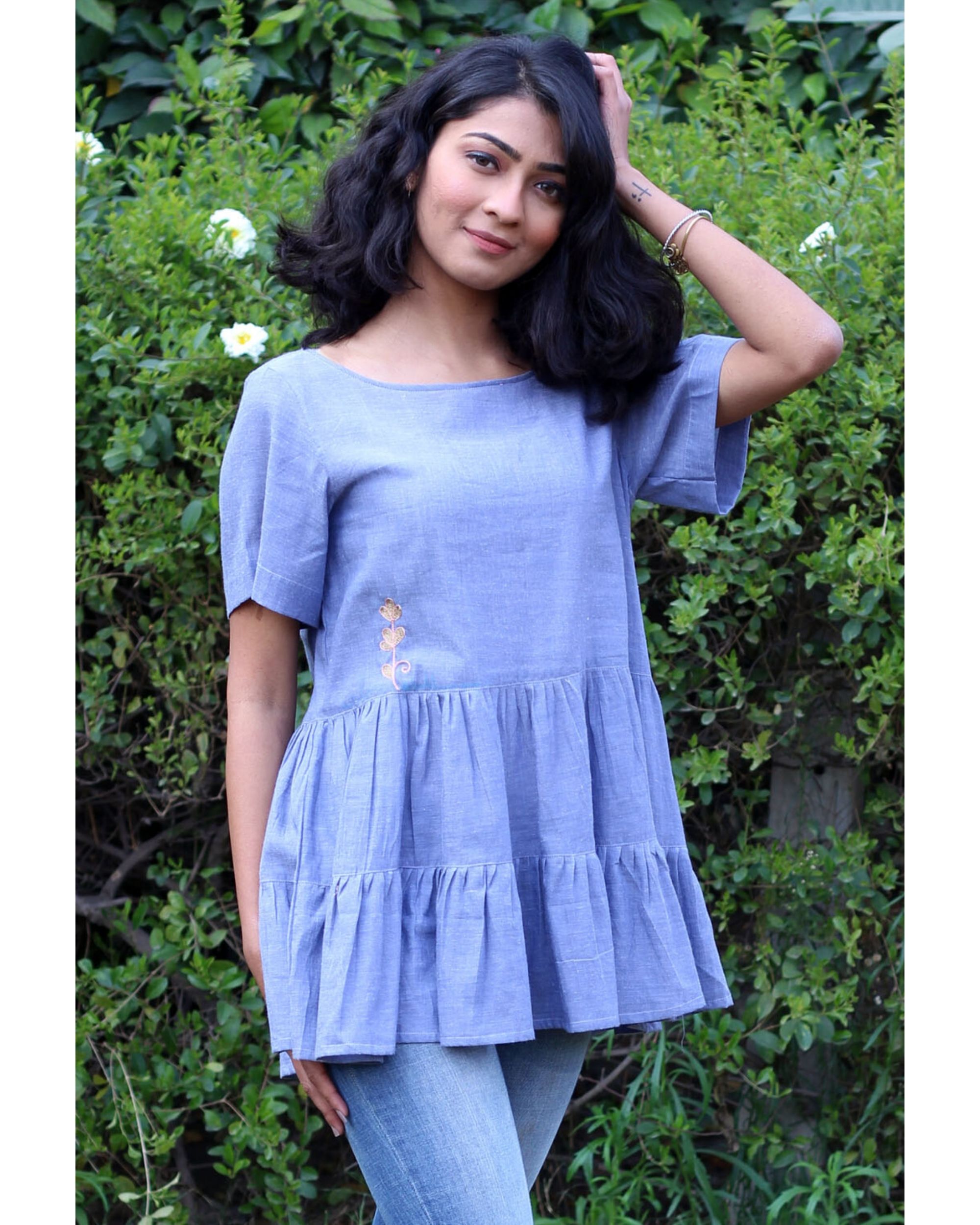 Ice blue embroidered ruffle top