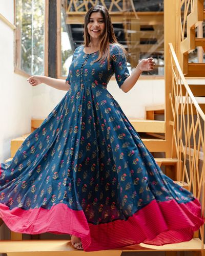 Blue floral flared dress with pink border by Athira Designs | The ...