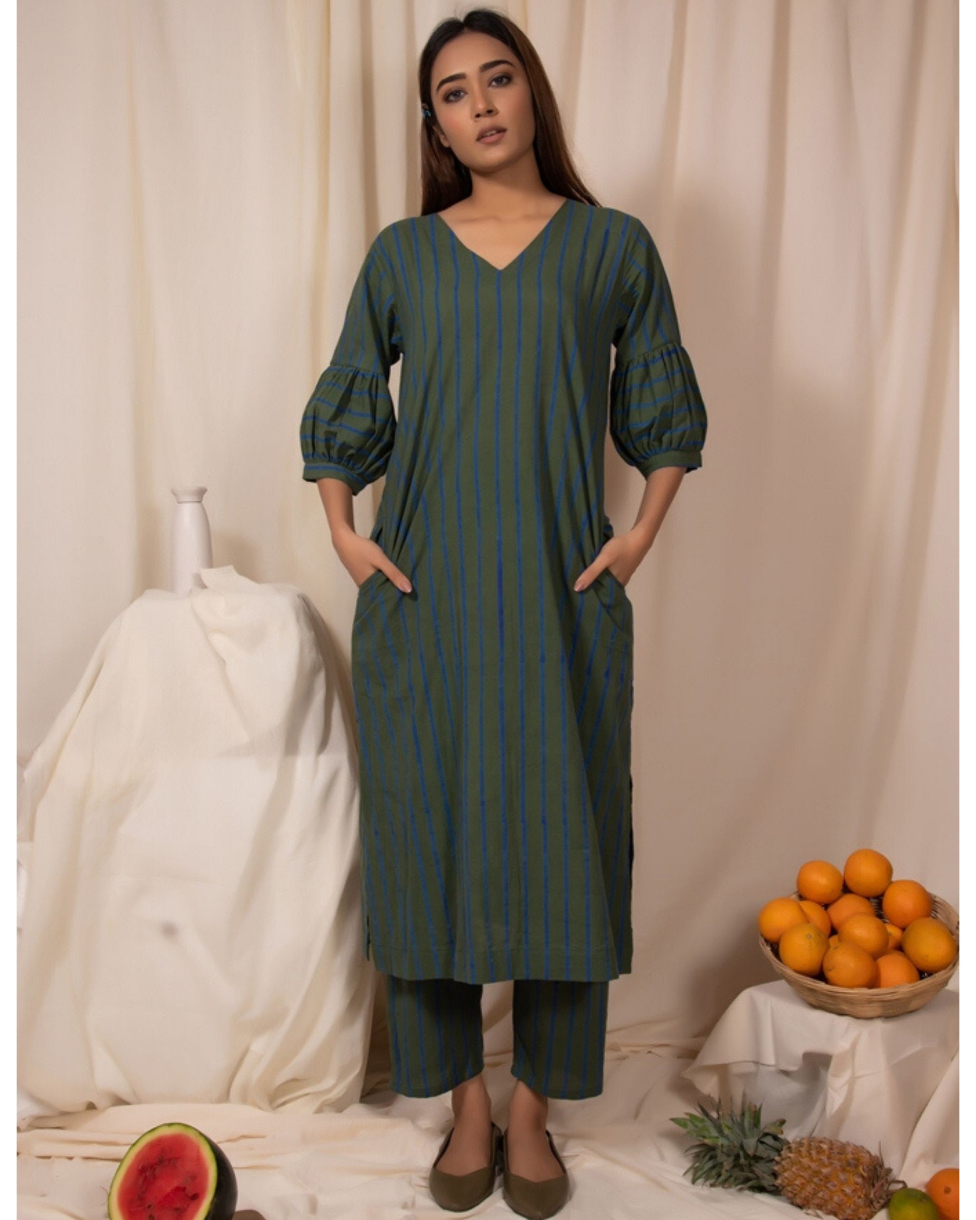 Dark green striped kurta with pockets by Silai | The Secret Label