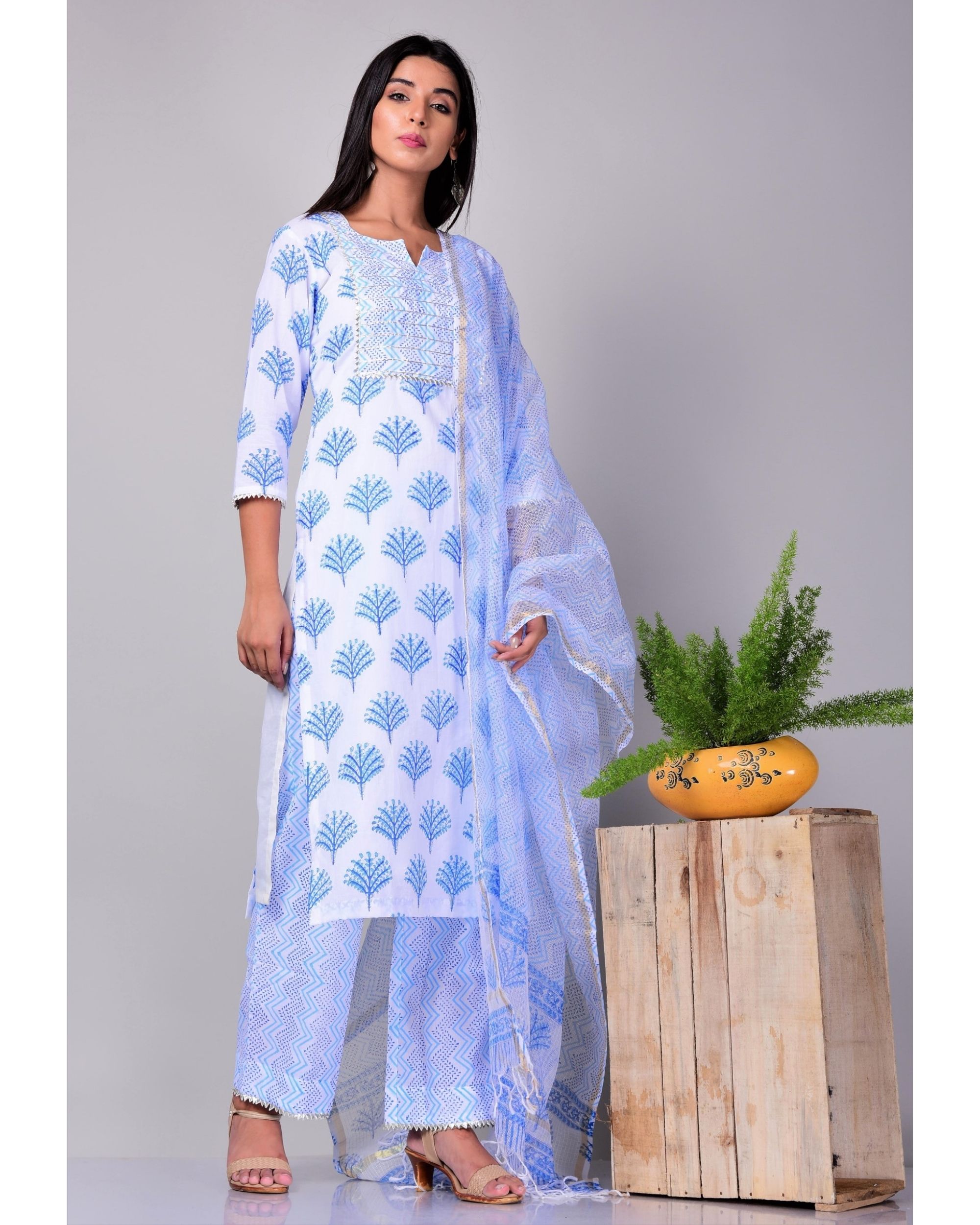 This three piece set includes kurta, palazzo pants and dupatta