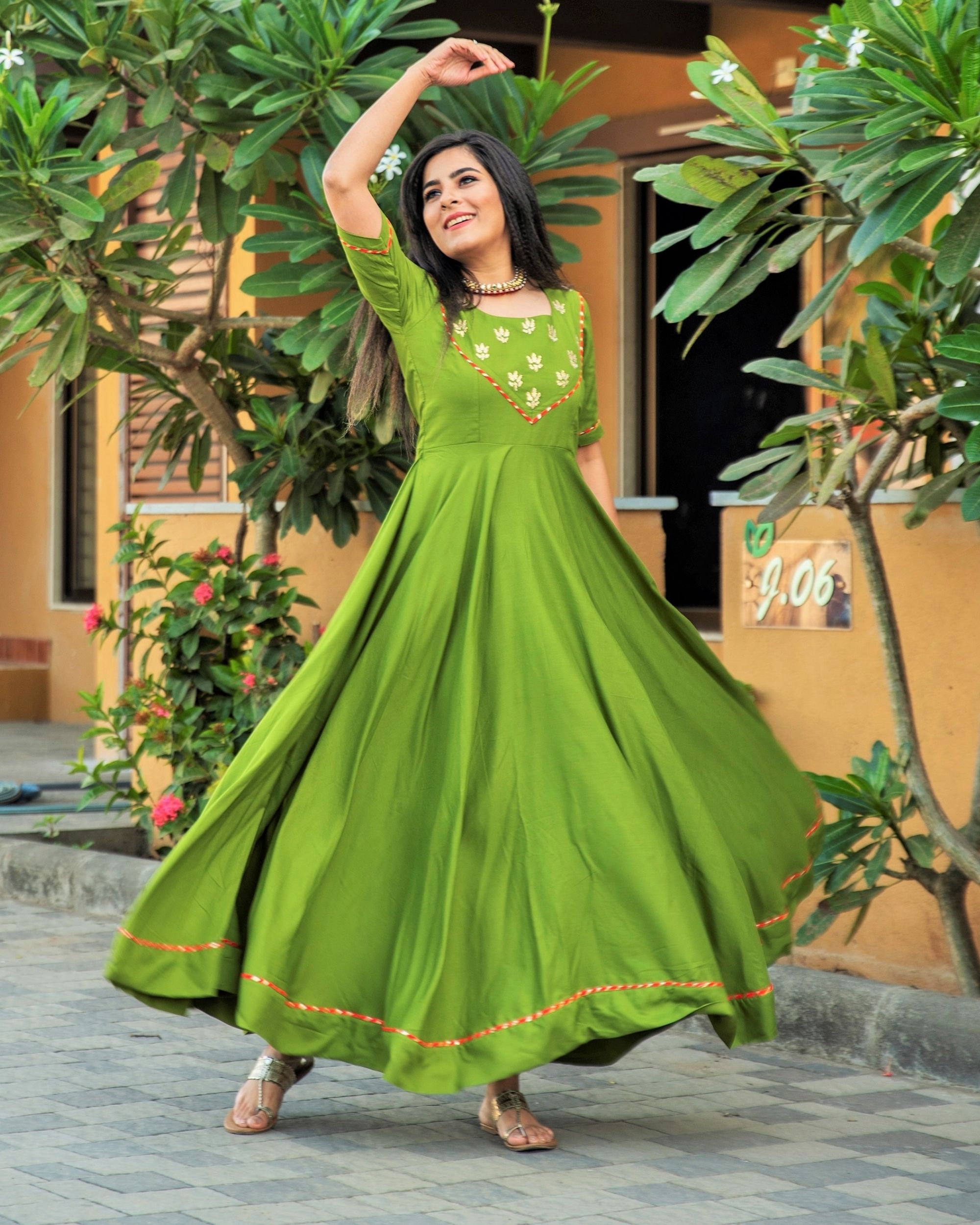 Olive green flared dress with yoke detailing by Shreetatvam | The ...