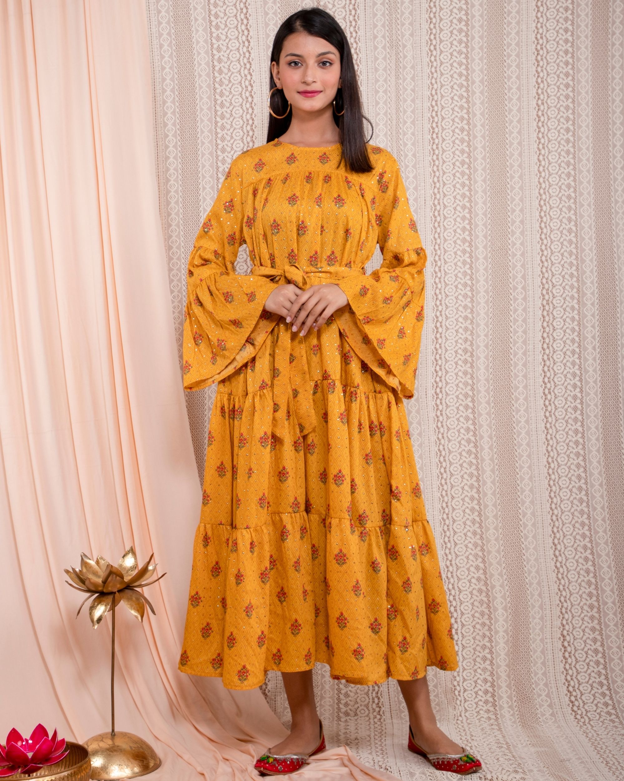 Mustard yellow tiered dress with belt by Studio Misri | The Secret Label