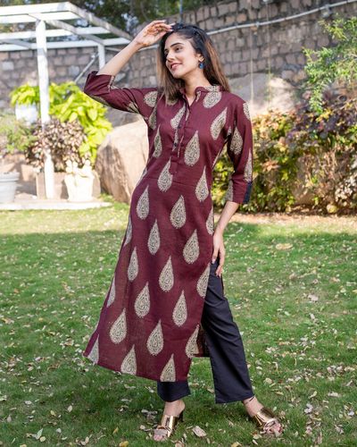 Maroon flared top with a-line palazzo by Desi Doree