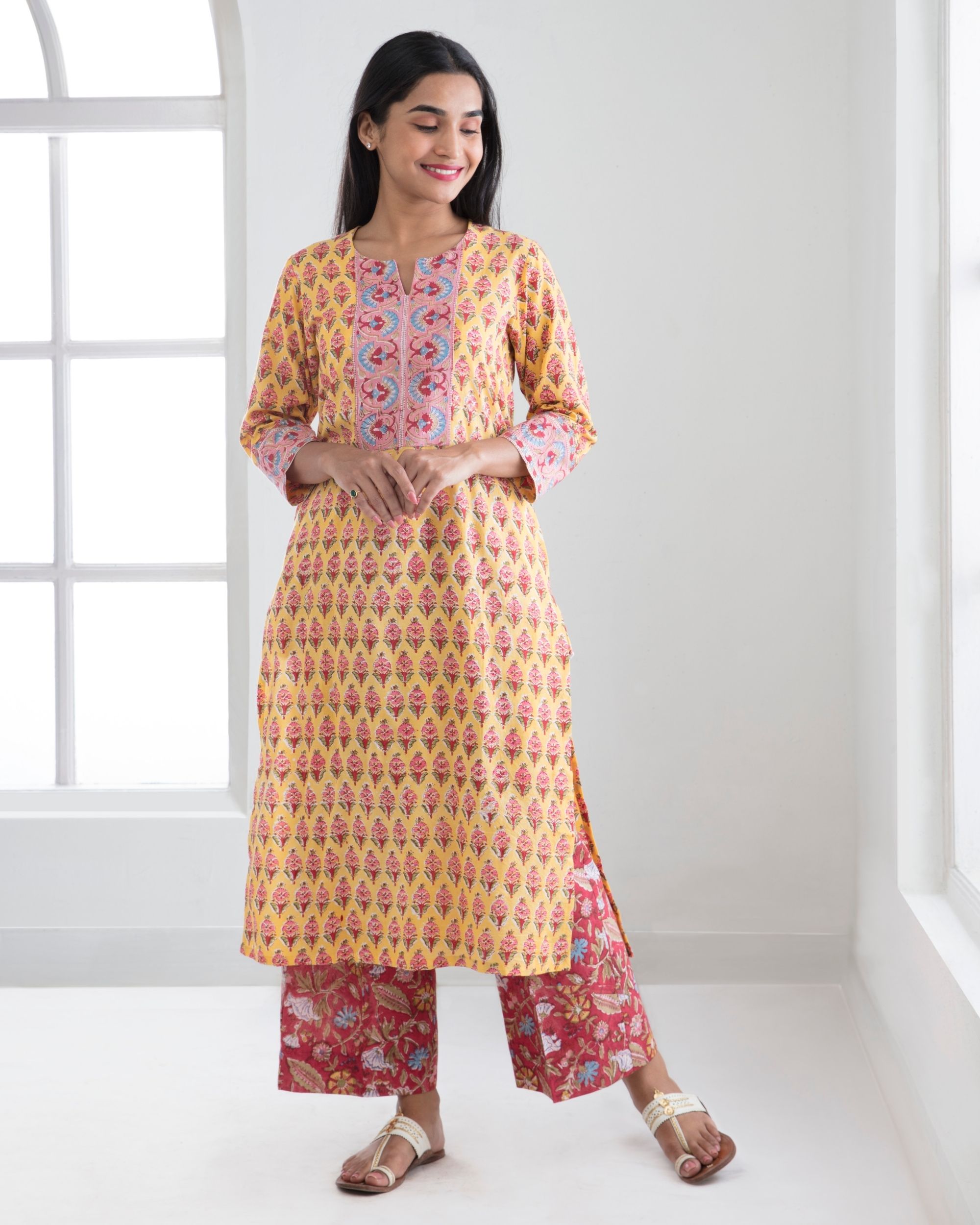 Mustard kurta with surkh pants set of two by Sneha Adwani The