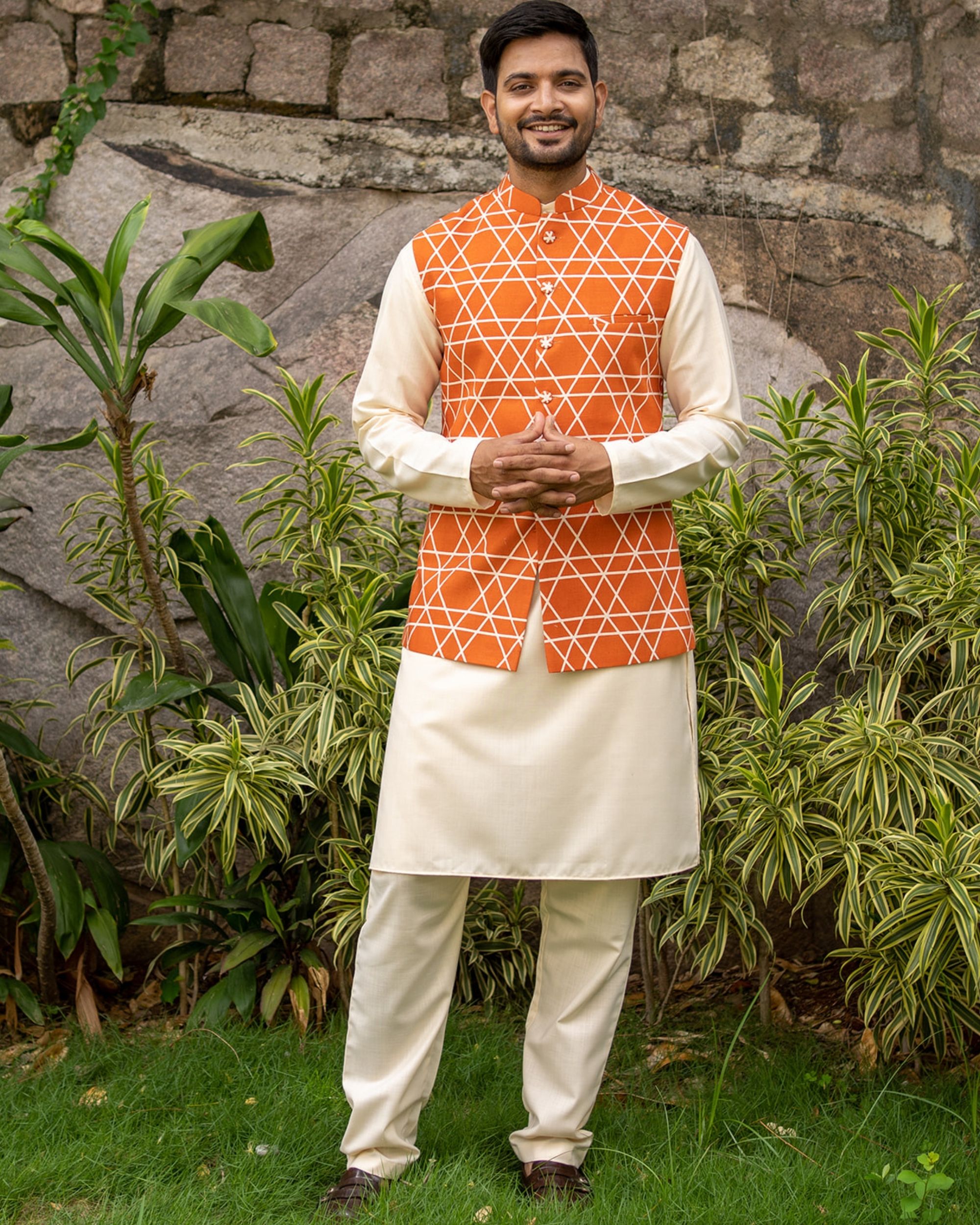 Orange criss cross nehru jacket with off white kurta and pyjama - set of three