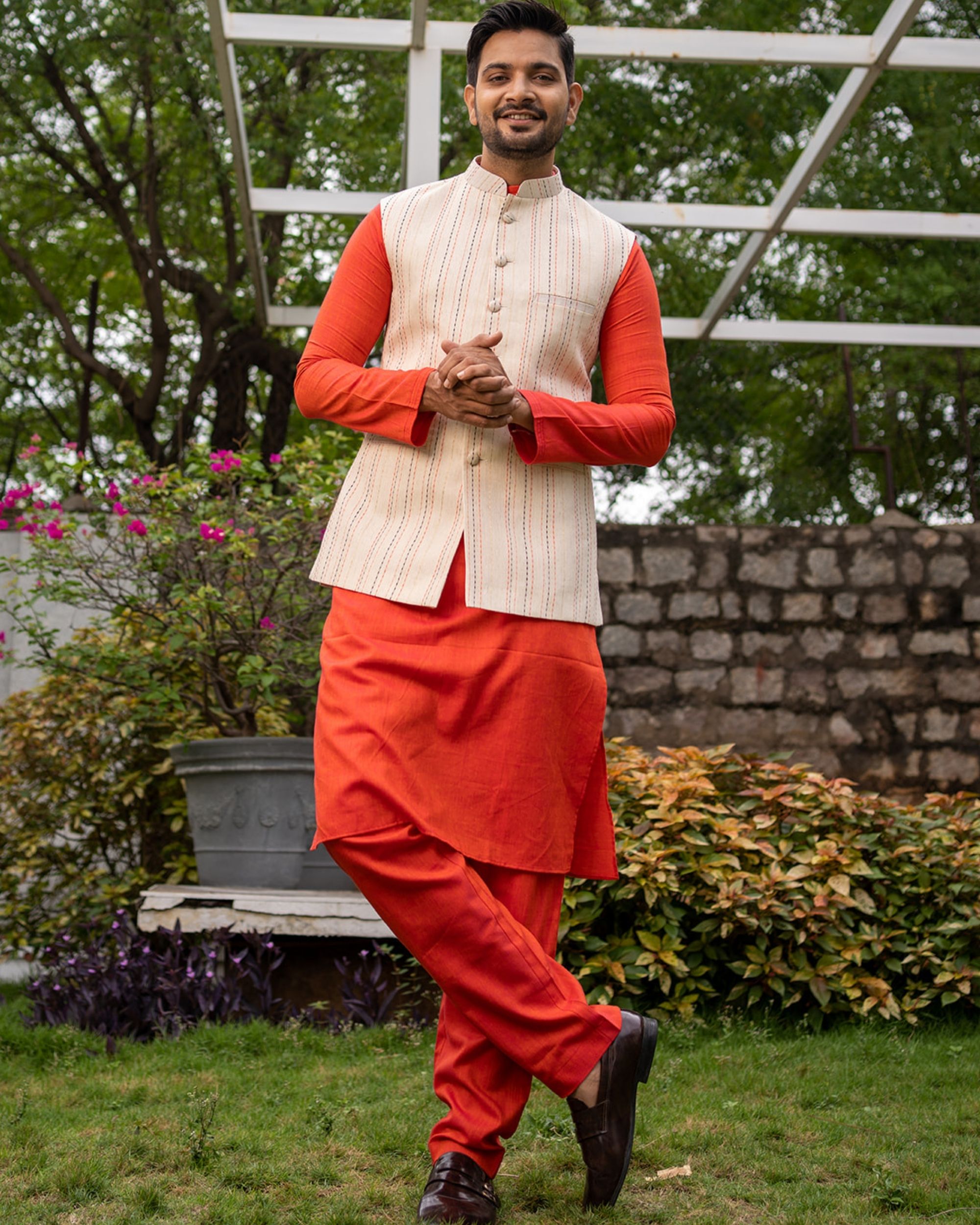 Beige striped nehru jacket with orange kurta and pyjama - set of three