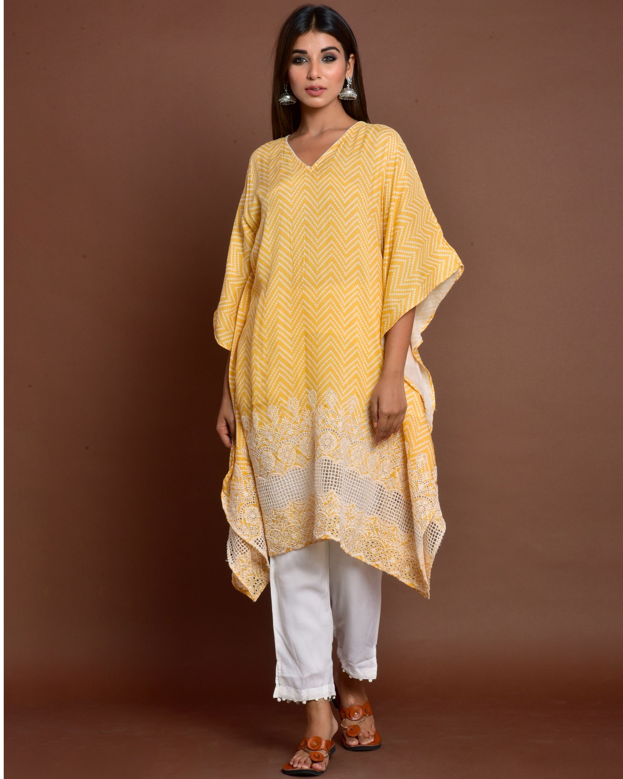 Yellow cutwork embroidered kaftan style kurta with white pants - set of two
