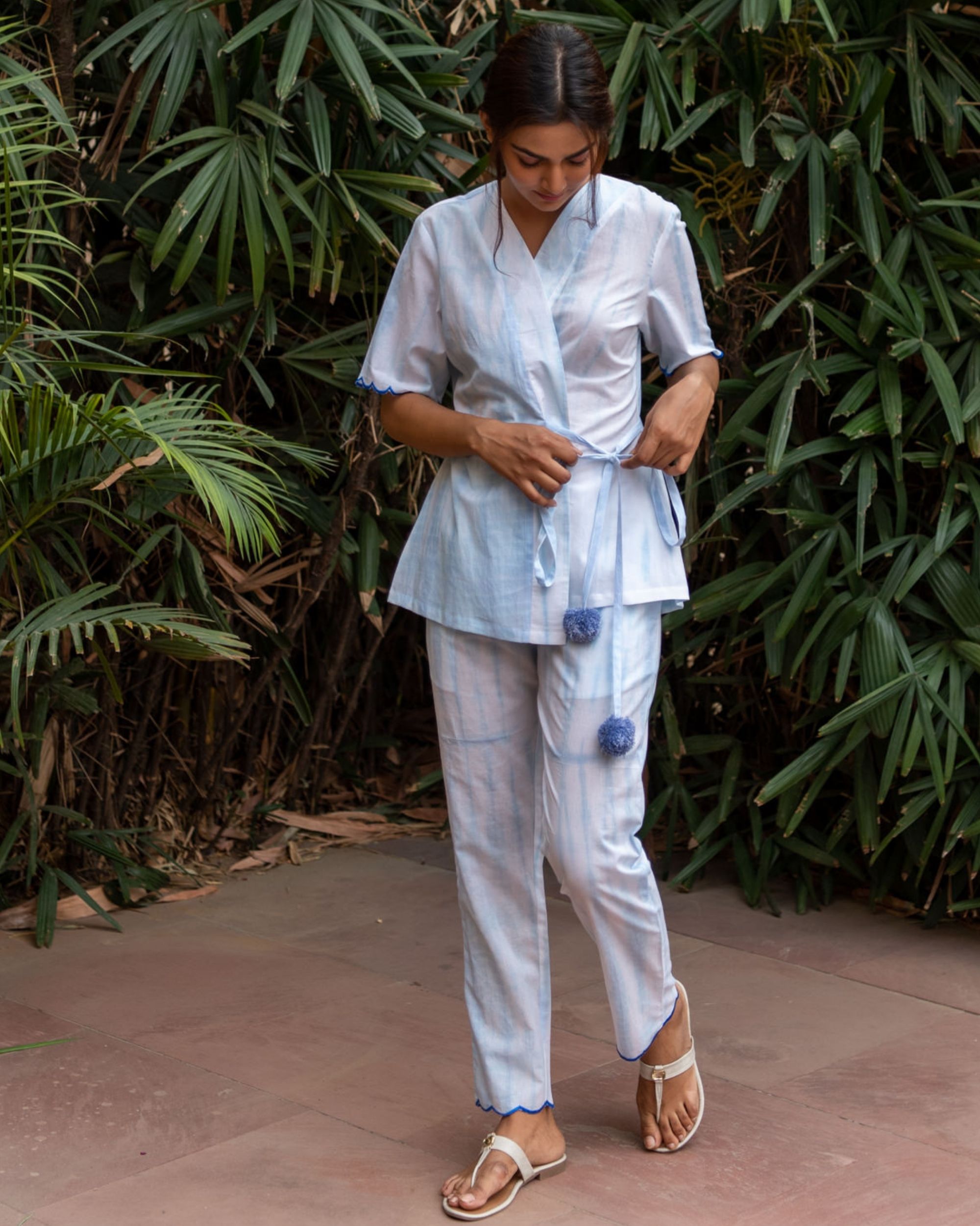 Free Photo | African american woman wearing blue long-sleeve shirt with white  pants