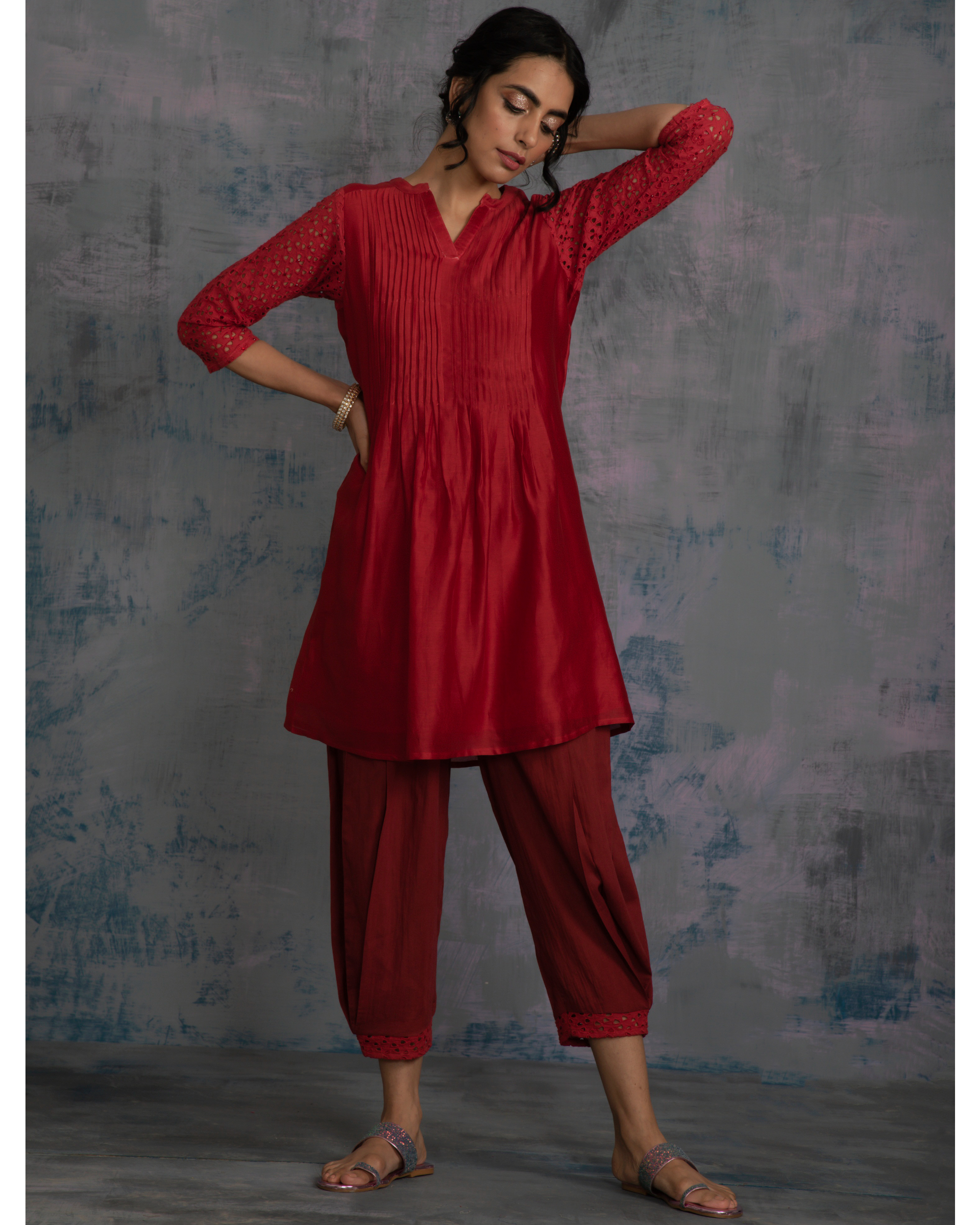 Scarlet red pintuck kurta with rust side pleated salwar - set of two