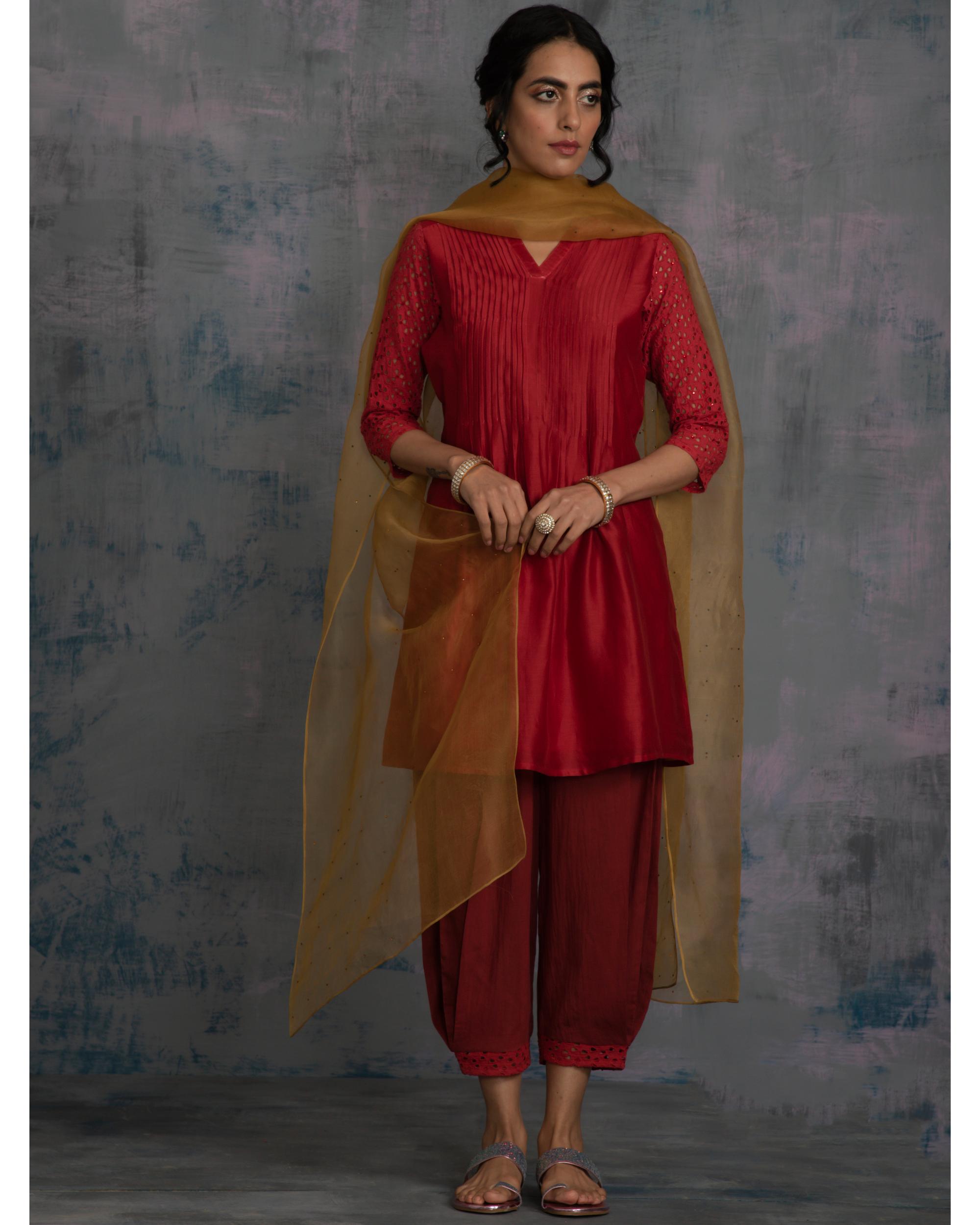 Scarlet red pintuck kurta with rust side pleated salwar and gold dupatta - set of three