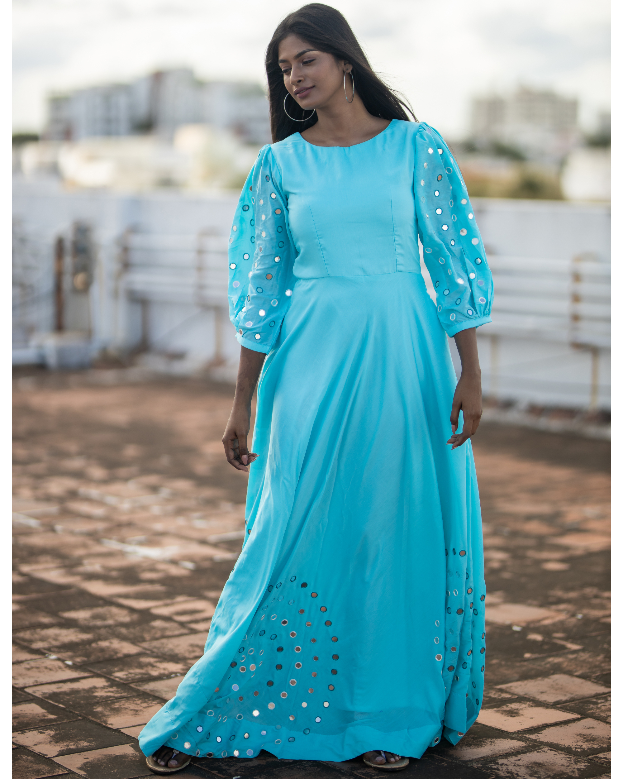 Sky blue flared dress by Kundavai