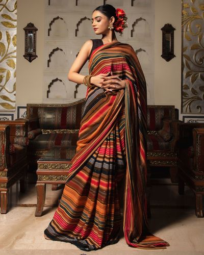 Multicolour embroidered pure chiffon saree by Calmna